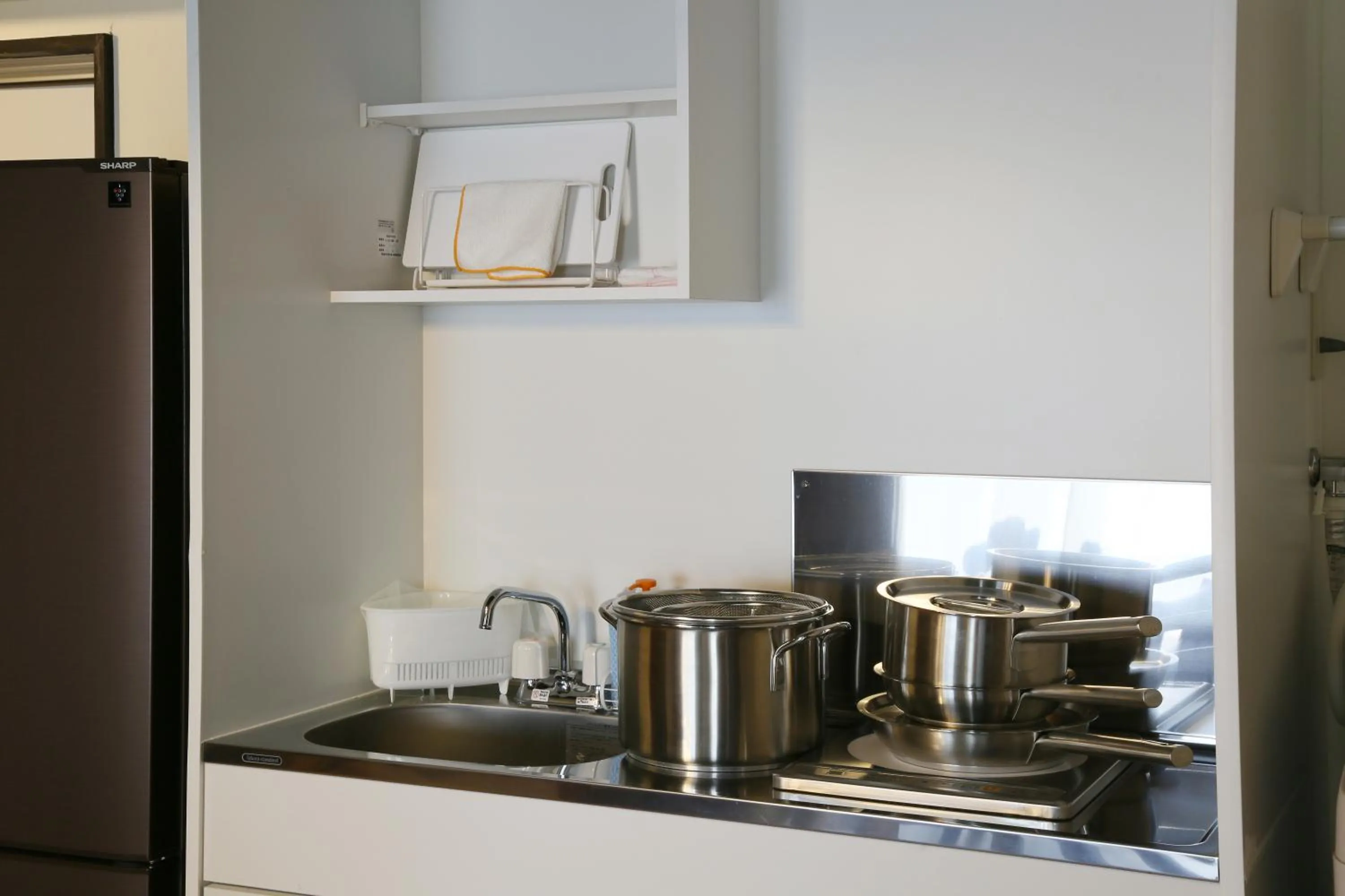 Kitchen or kitchenette in Sky Cuculu Ishigakijima