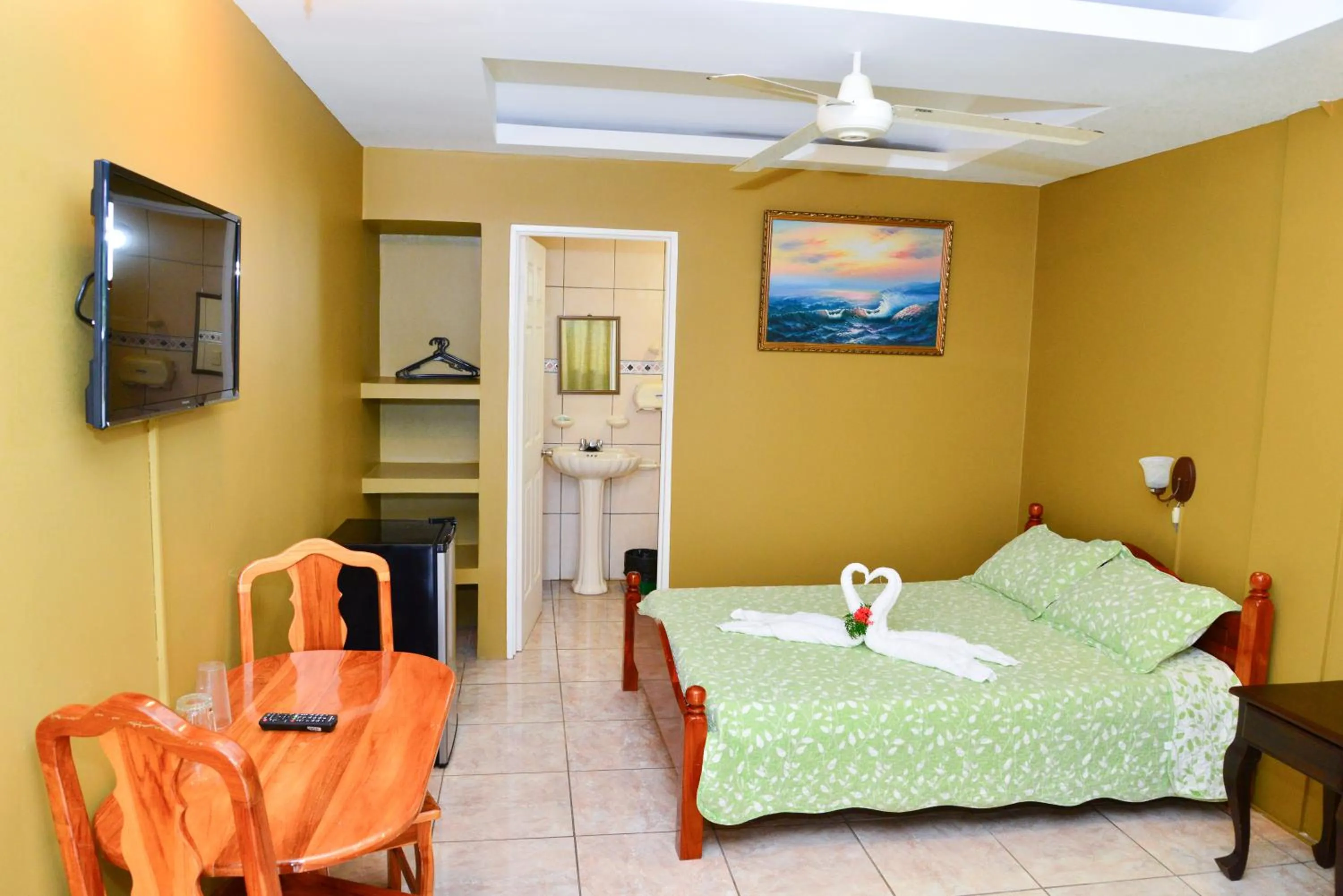 TV and multimedia, Bed in Hotel Le Priss