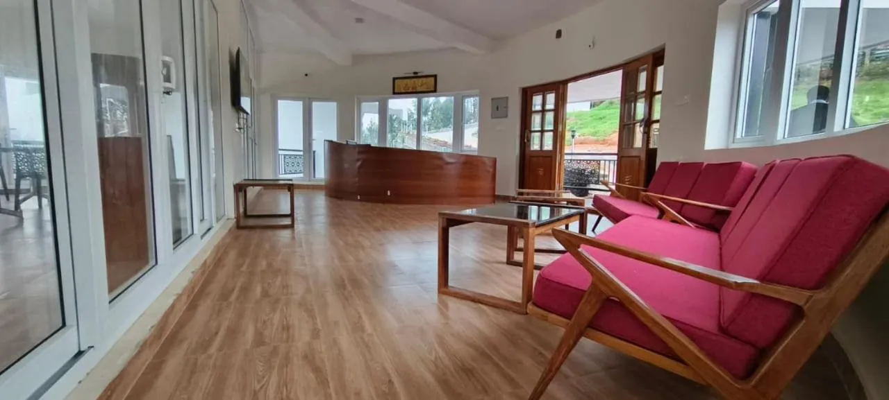 Living room in COASTAL GRAND RESORT - KOTAGIRI