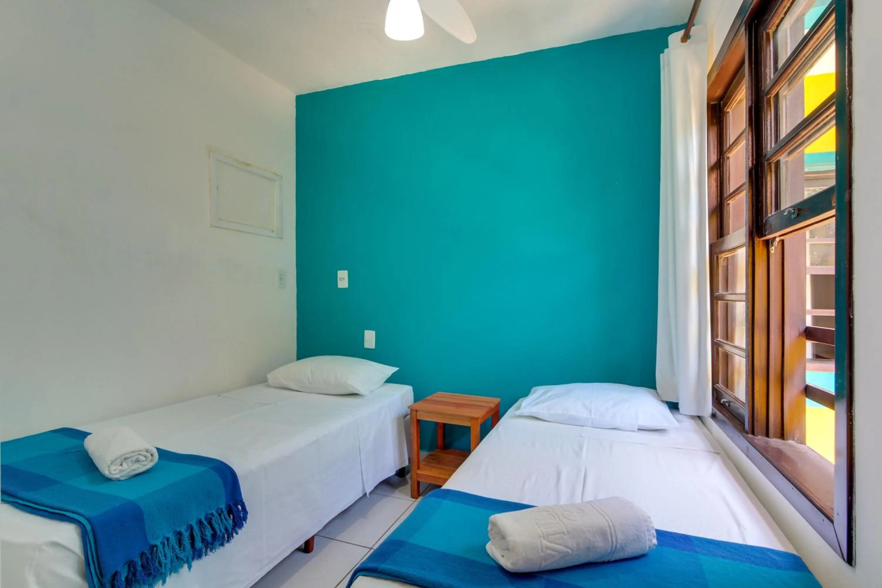 Bed in Residencial Vila do Sol, Apartamentos com pé na areia