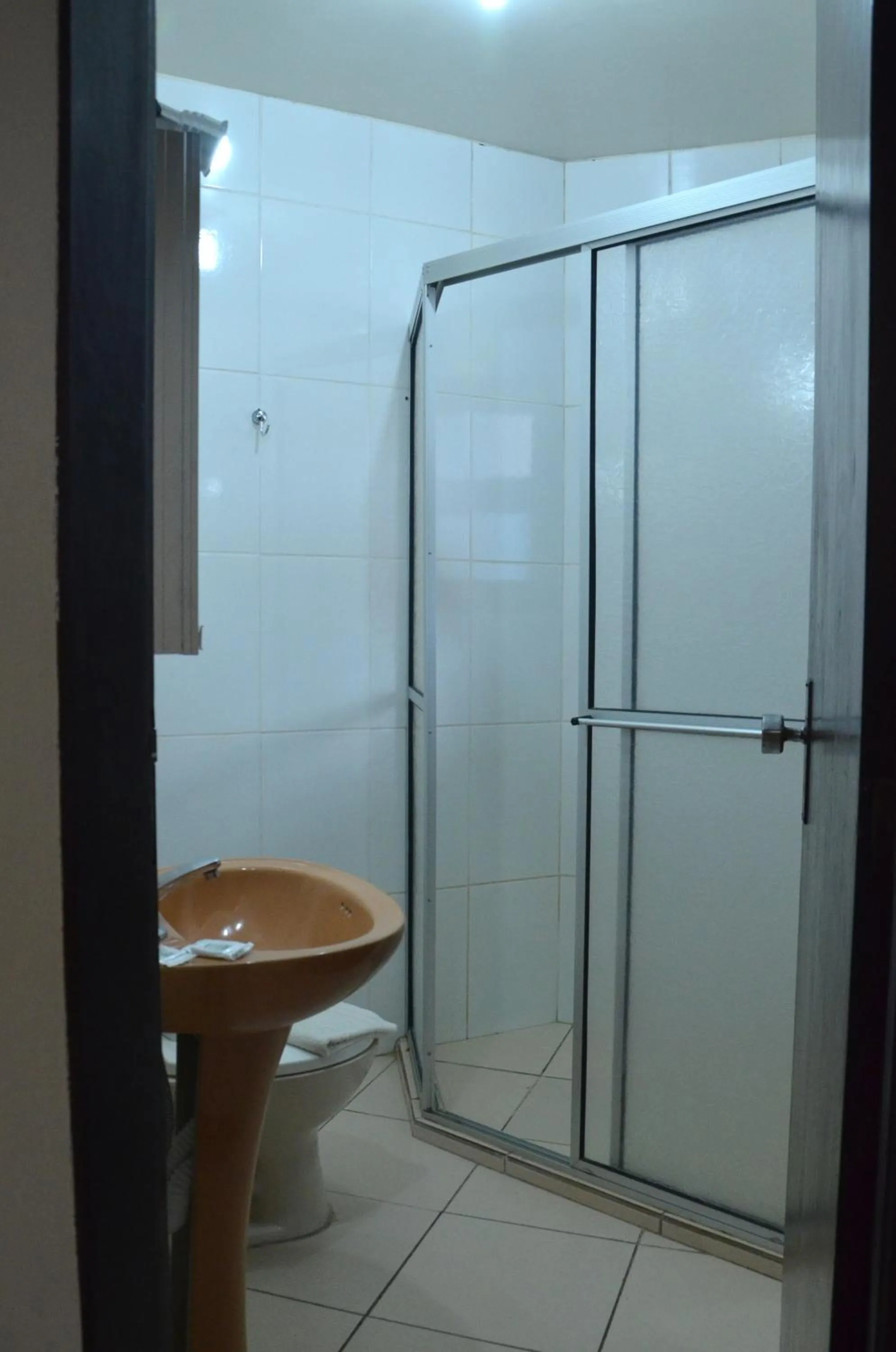 Bedroom in Residencial Vila do Sol, Apartamentos com pé na areia