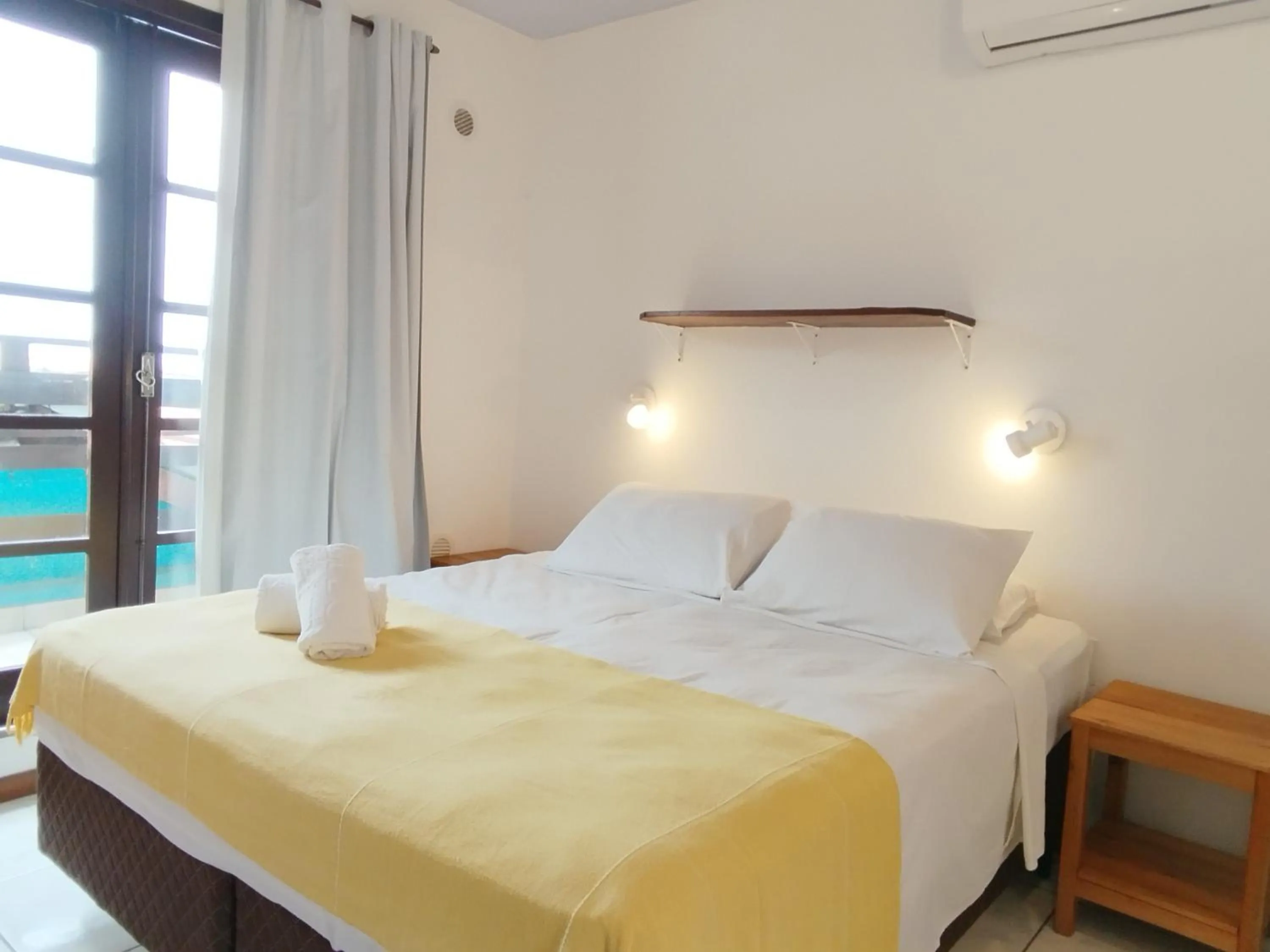 Bed in Residencial Vila do Sol, Apartamentos com pé na areia