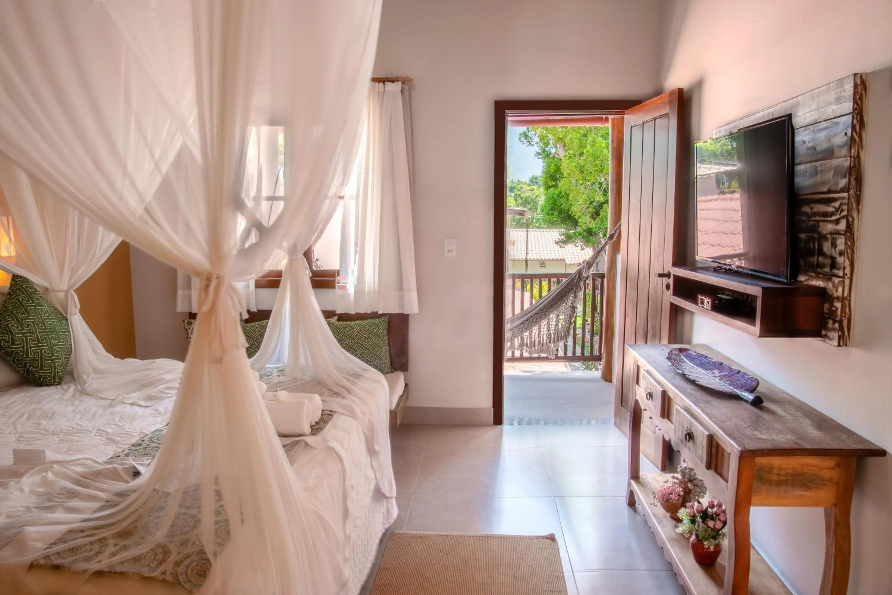 Bed in Pousada Maria Pitanga