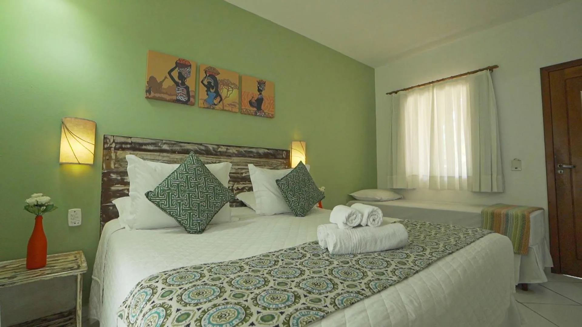 Bed in Pousada Maria Pitanga