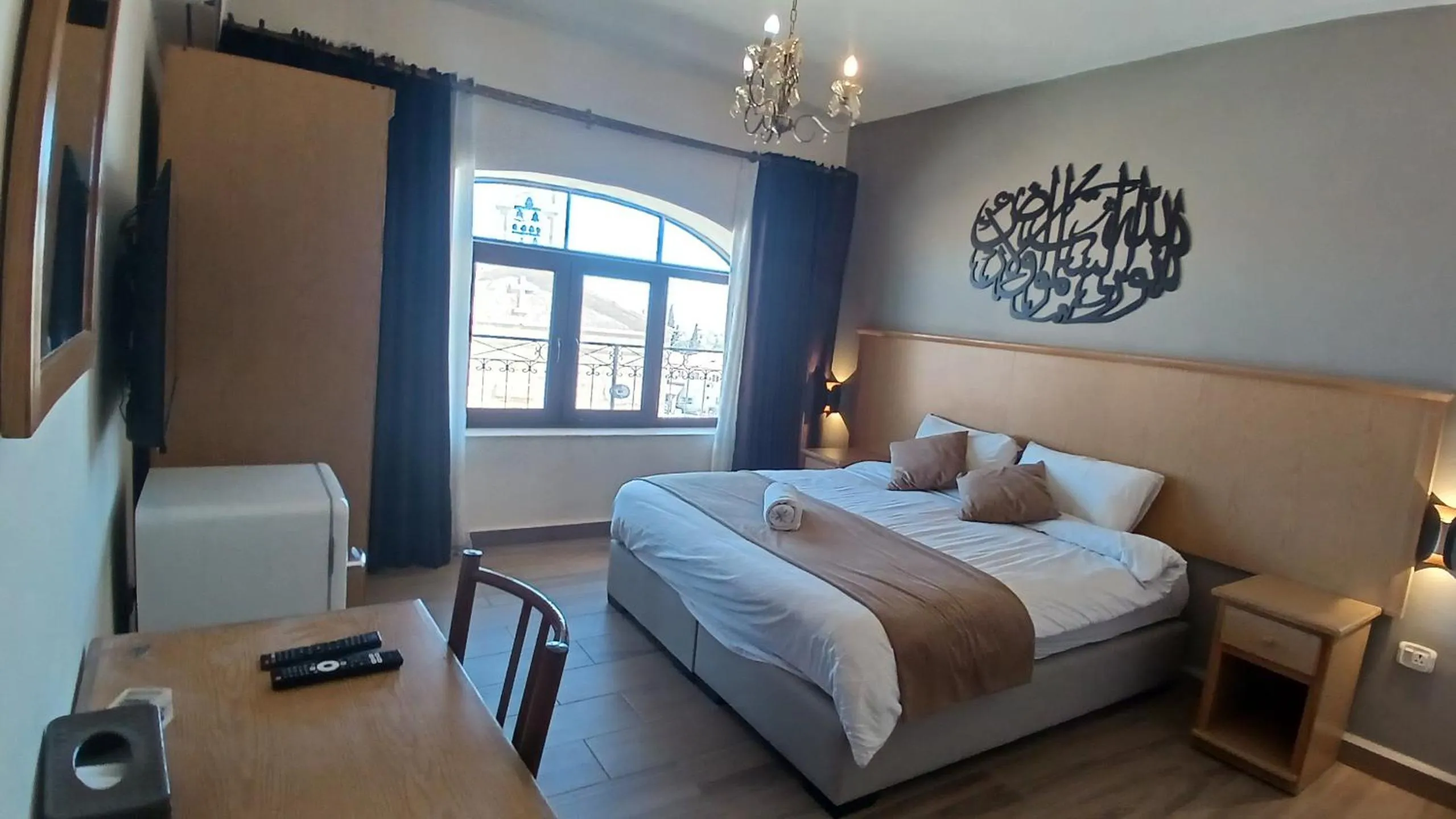 Bed in Moab Land Hotel