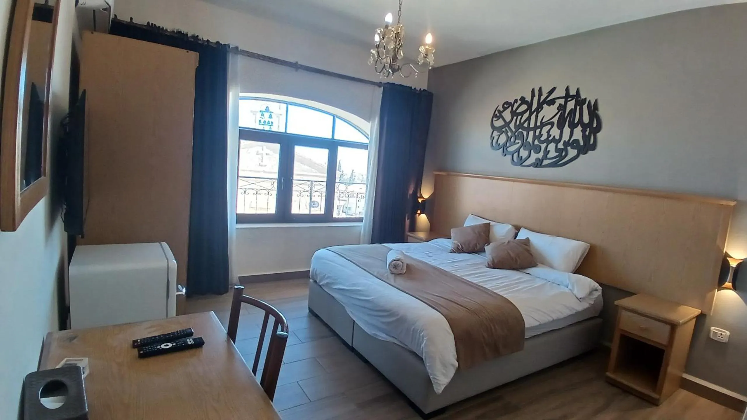 Bed in Moab Land Hotel