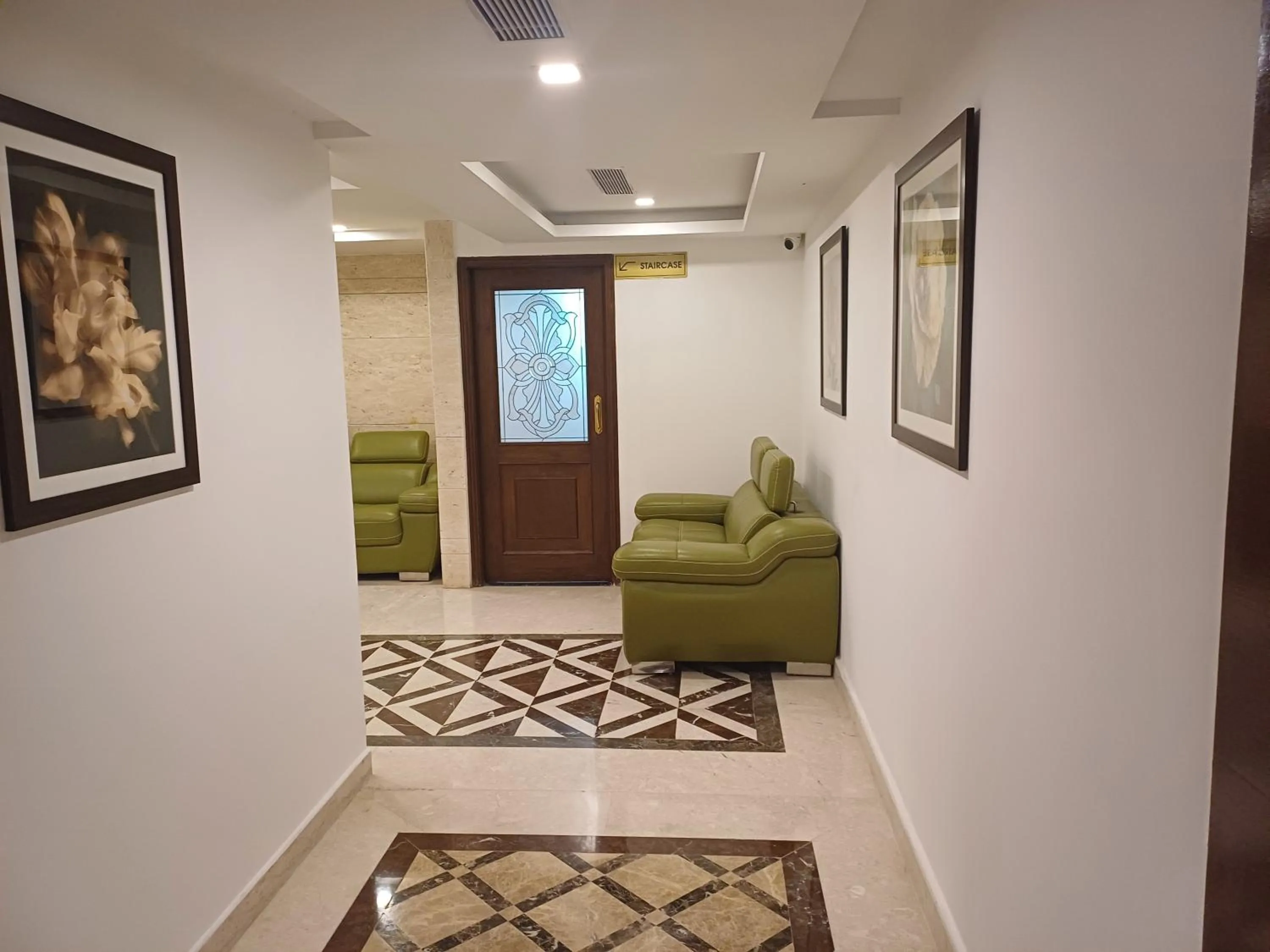 Seating area in Hotel Benzz Park Chennai