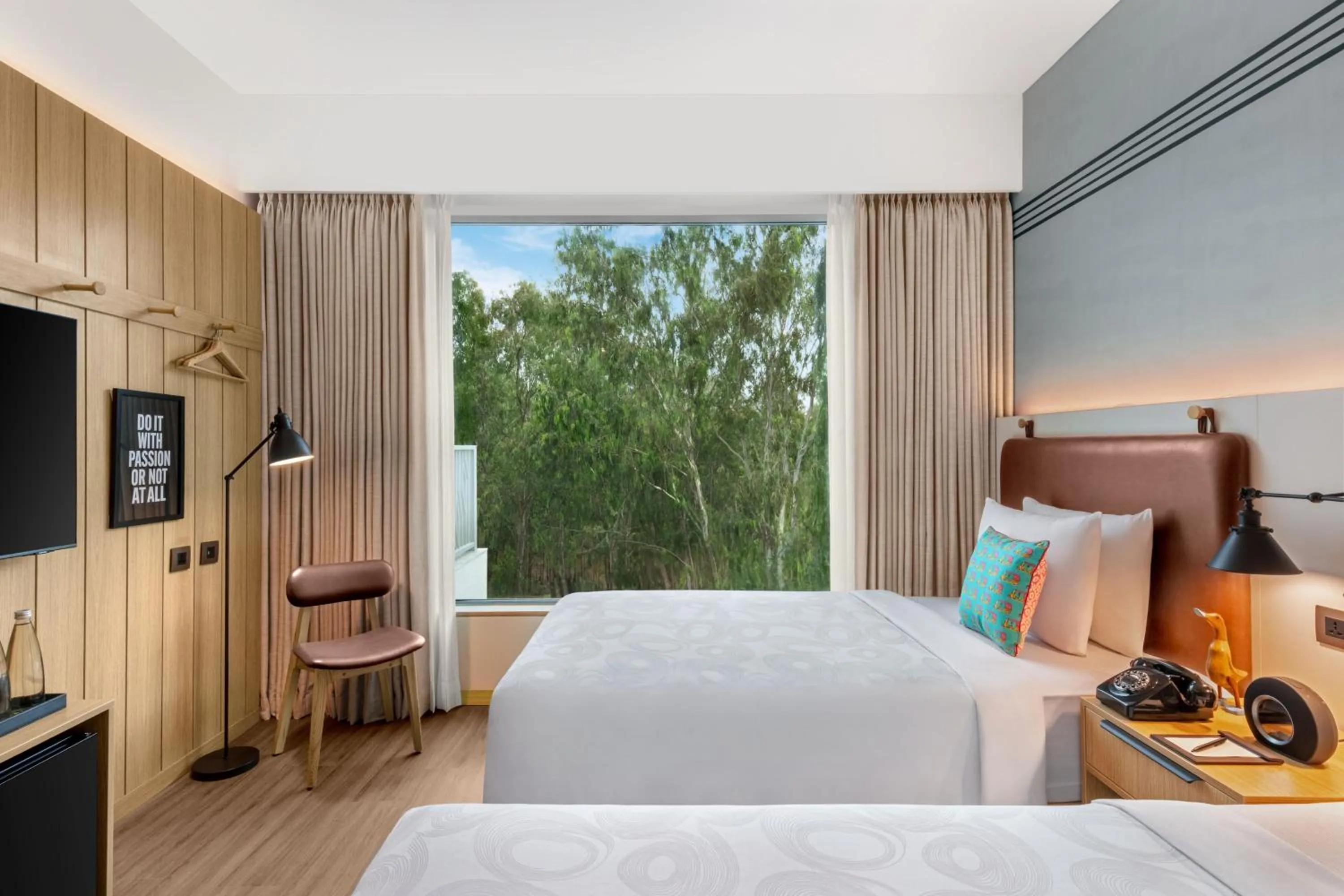 Photo of the whole room, Bed in Moxy Bengaluru Airport Prestige Tech Cloud