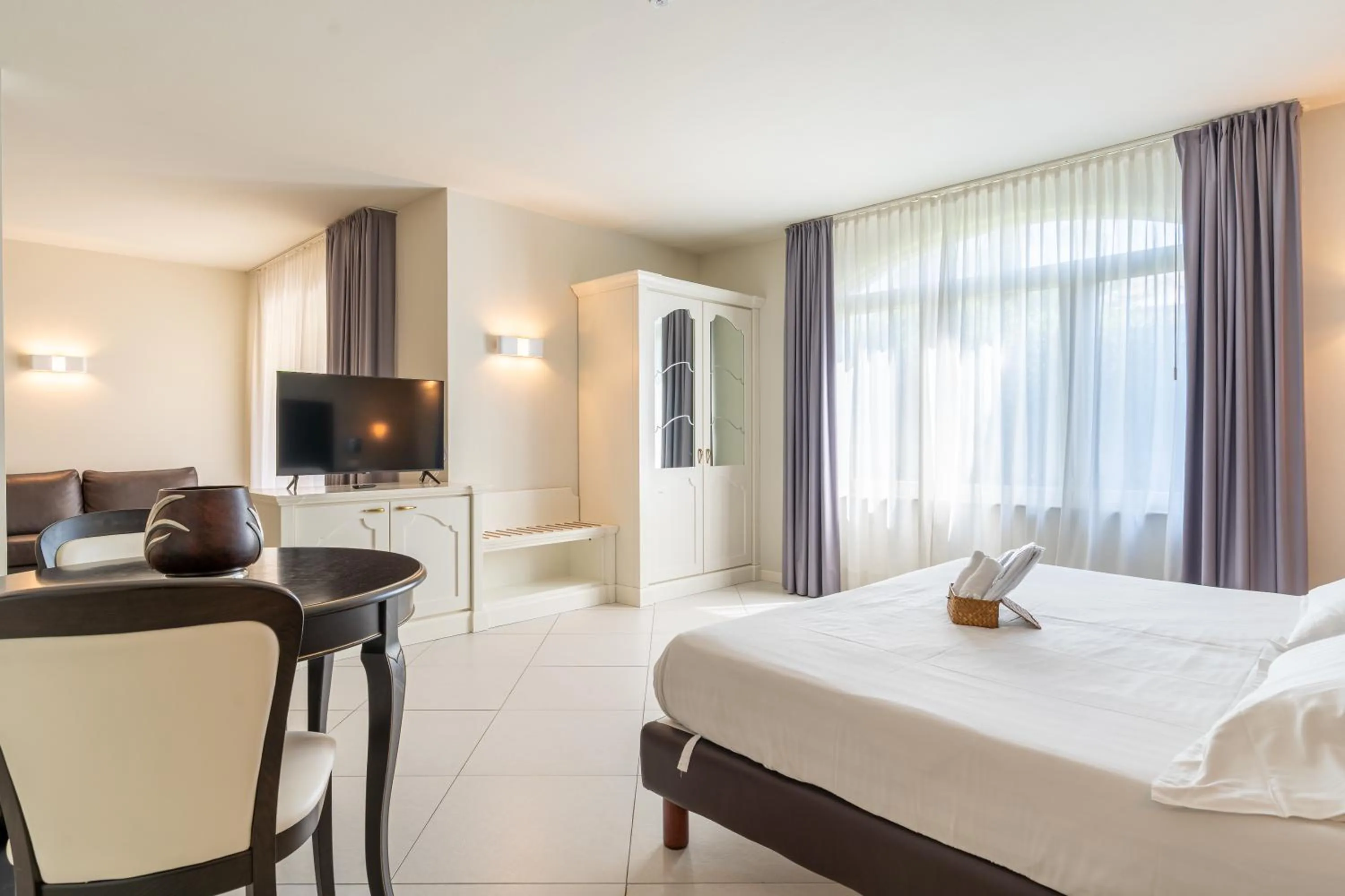 Living room, Bed in Monastero Resort & Spa - Garda Lake Collection