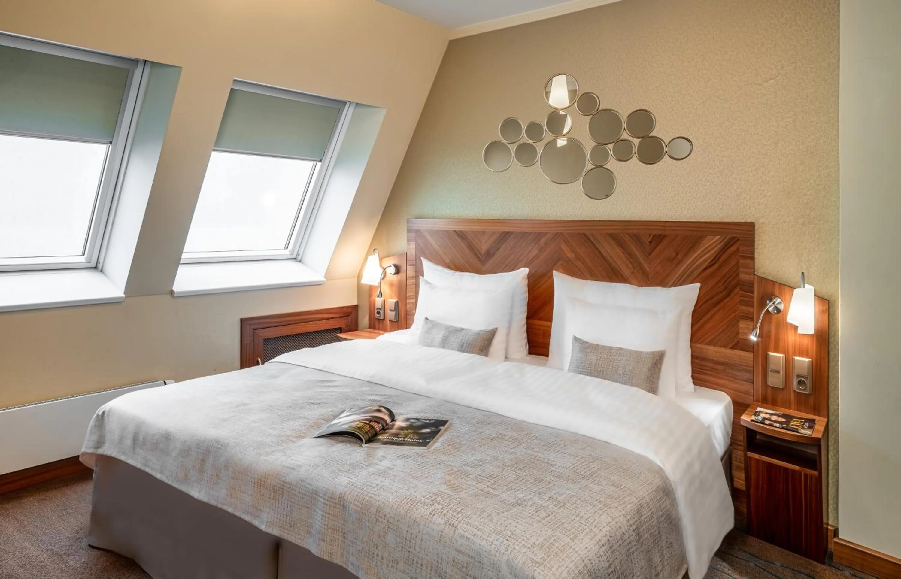 Bed in Crown Palace Apartments by Adrez