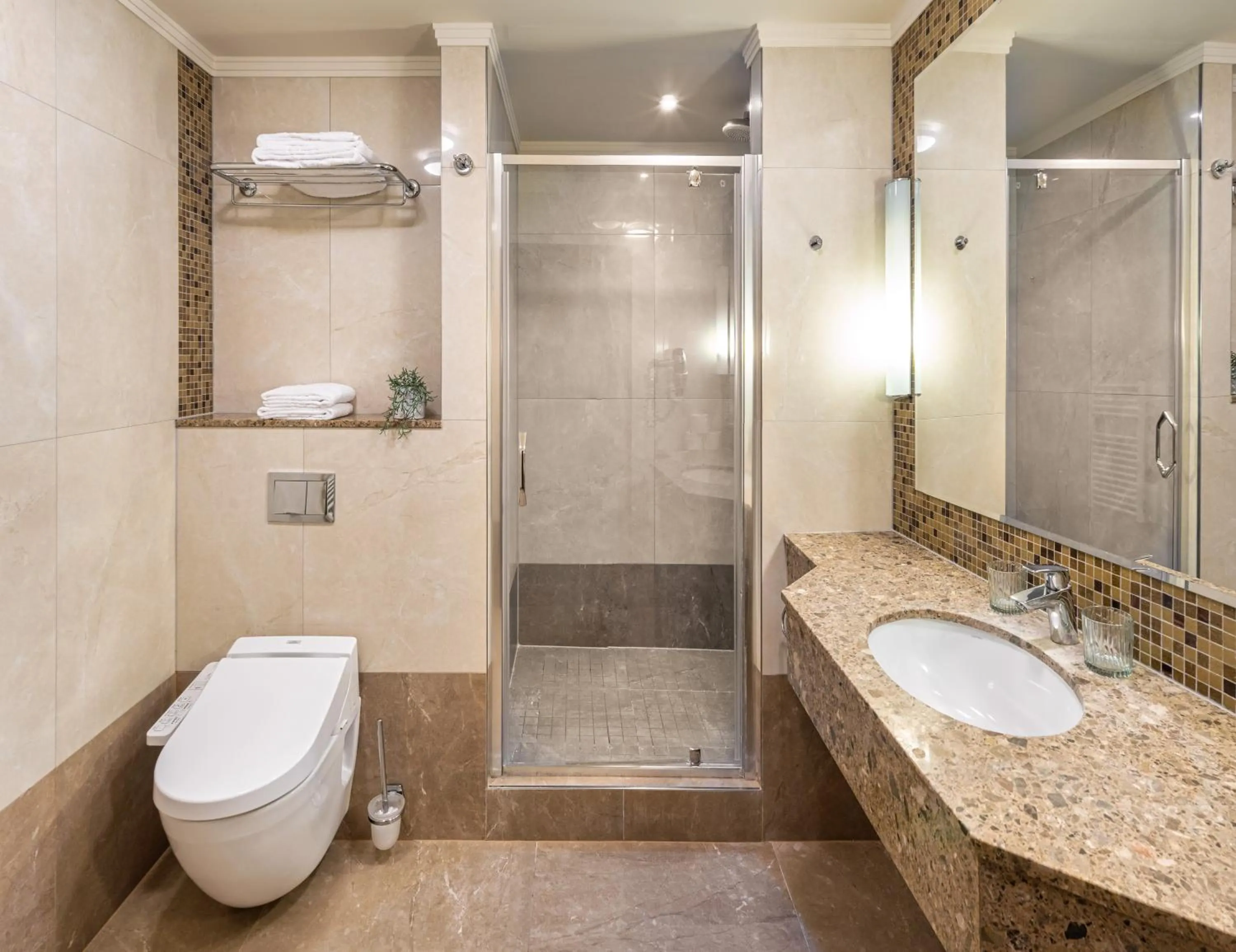 Bathroom in Crown Palace Apartments by Adrez