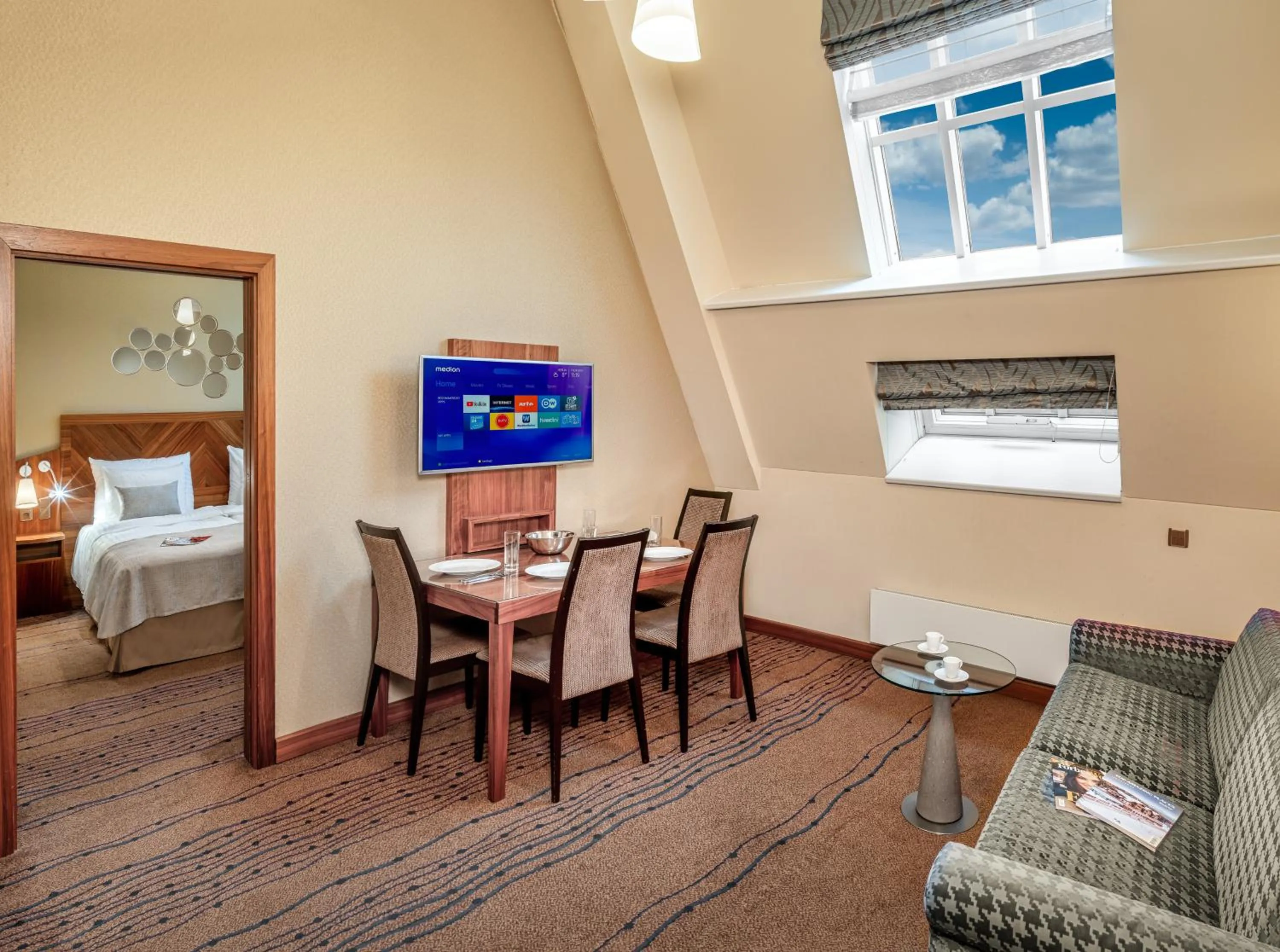 Living room, Bed in Crown Palace Apartments by Adrez