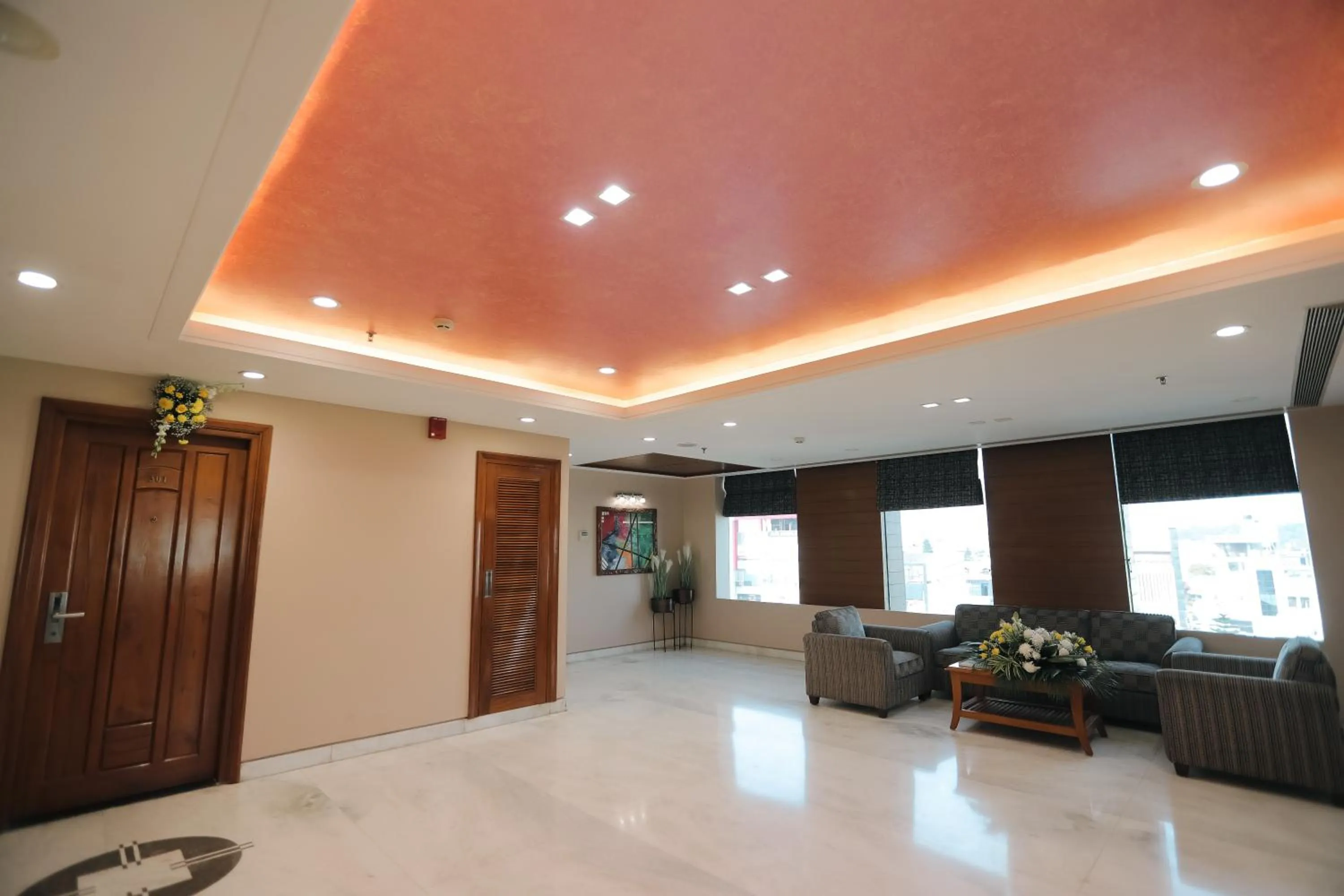 Seating area in Hotel Saffron Leaf