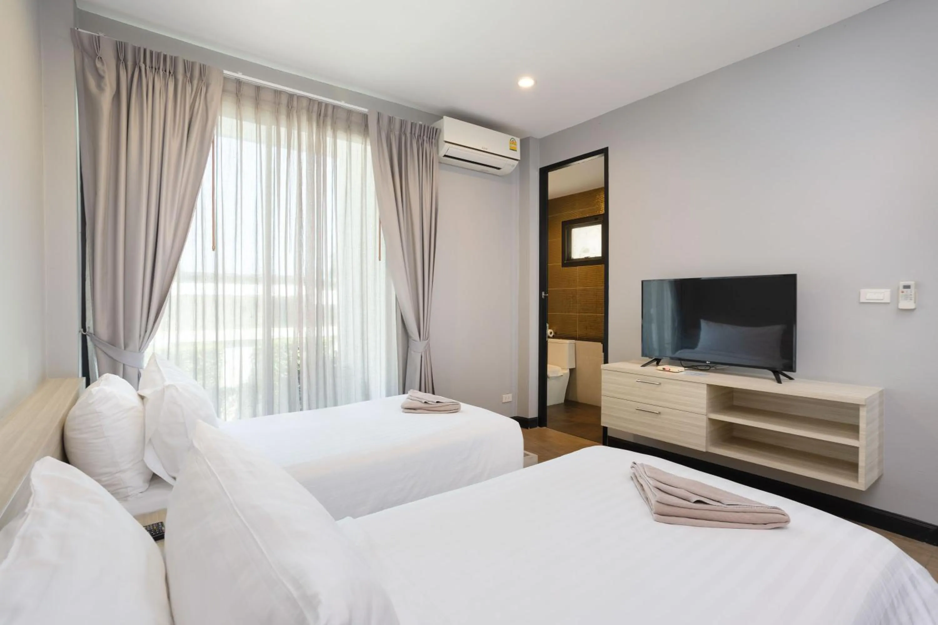 Communal lounge/ TV room, Bed in The Sea-Cret Garden Hua Hin