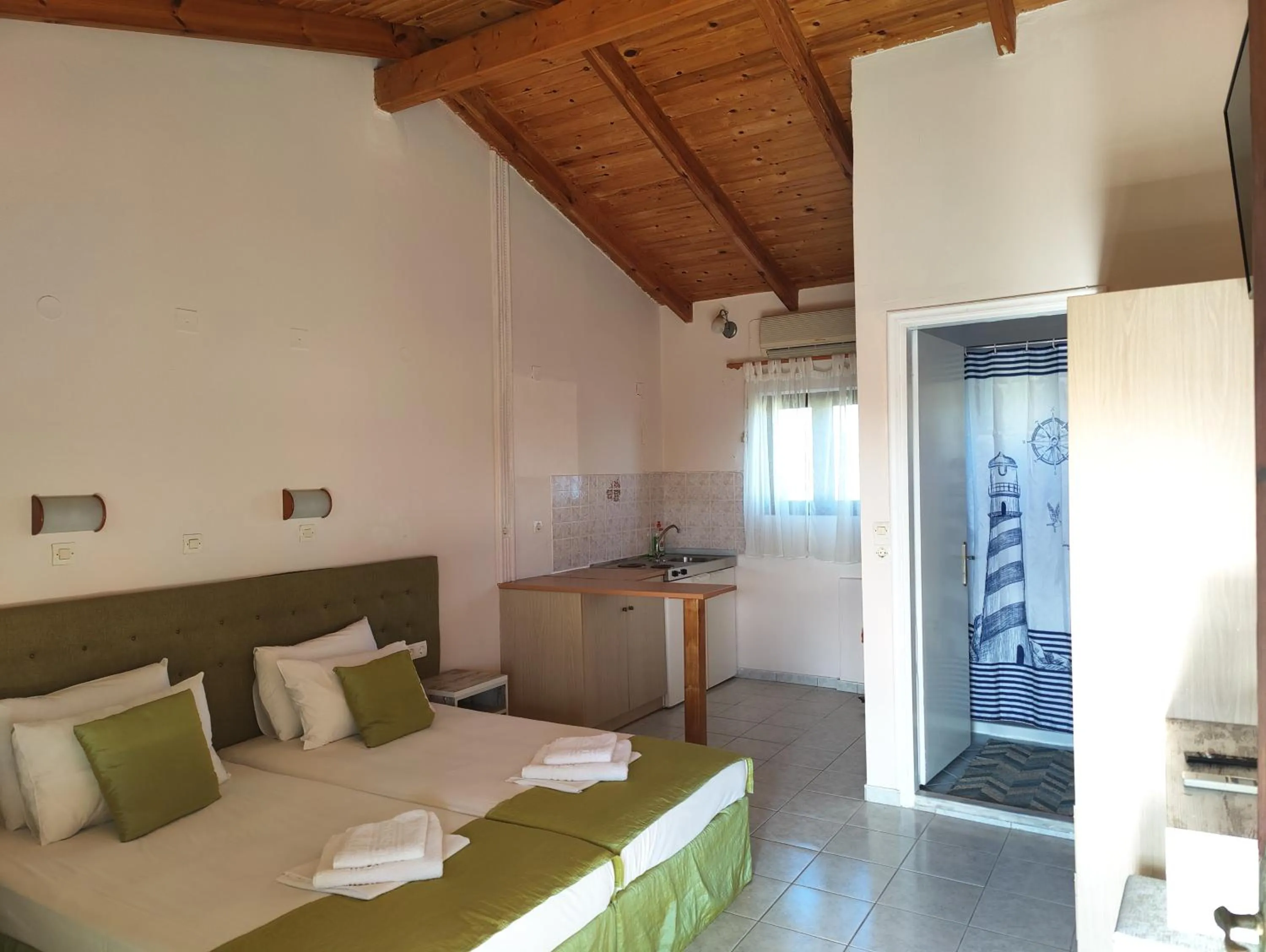 Kitchen or kitchenette, Bed in Blue Waves Corfu