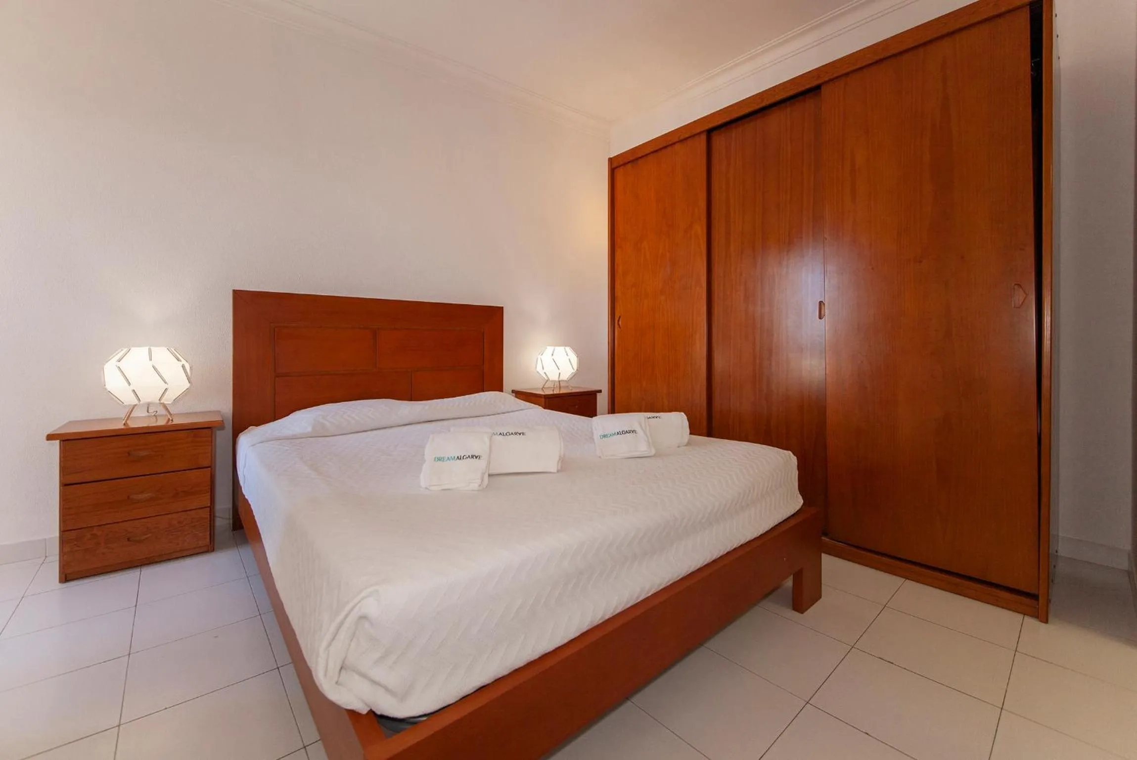 Bed in Candimar Beach Apartment