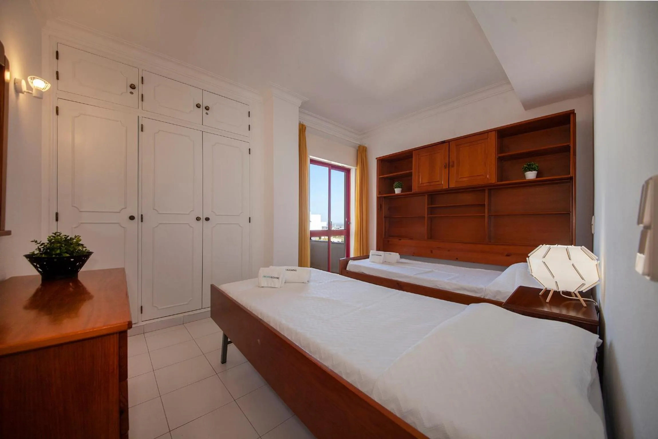 Bed in Candimar Beach Apartment