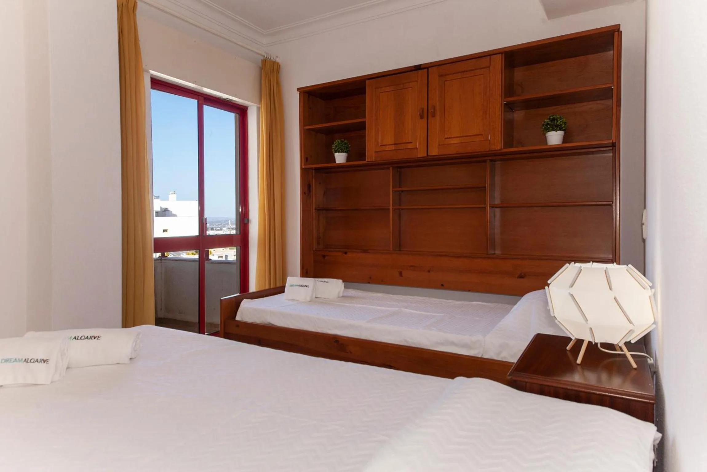 Bed in Candimar Beach Apartment