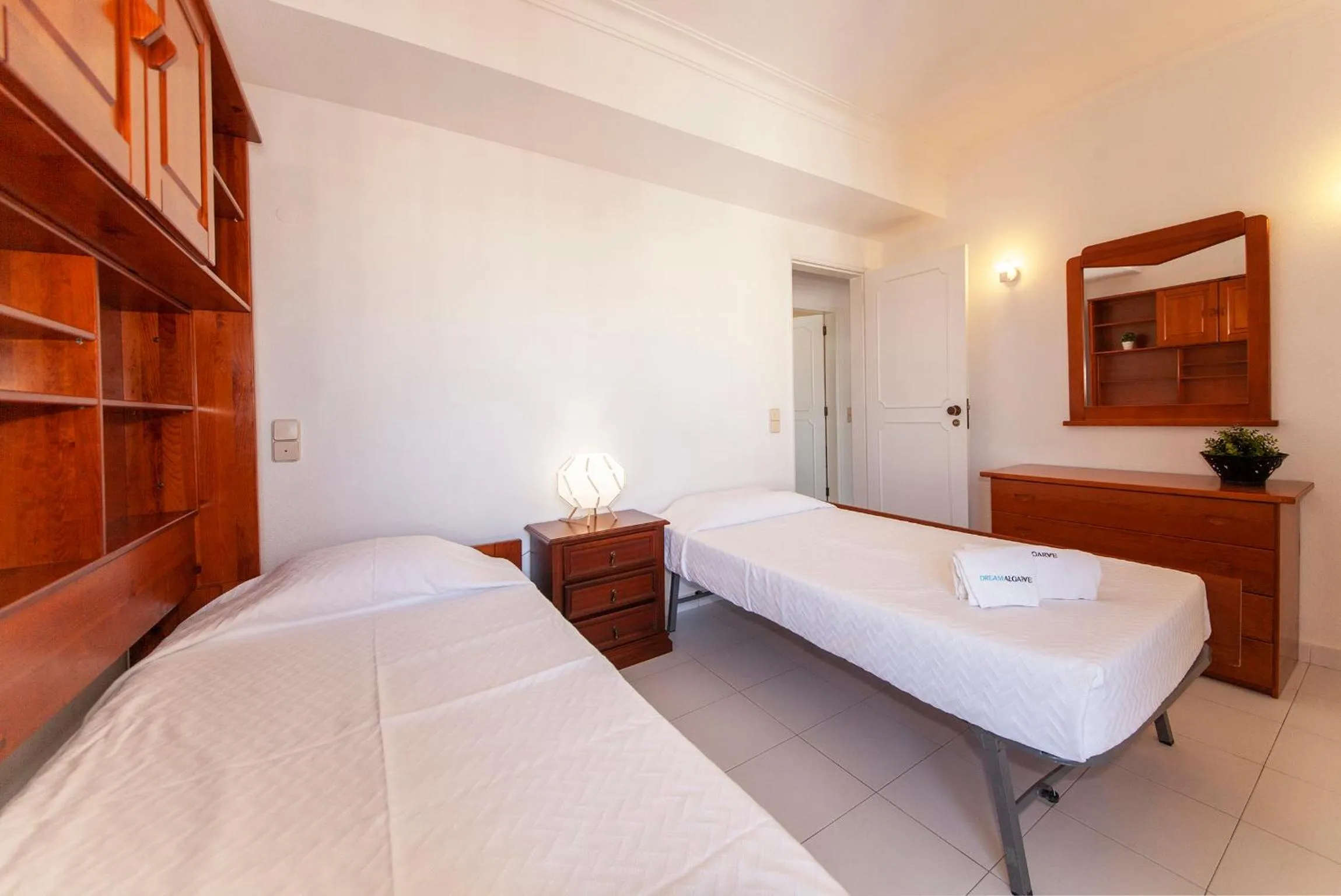 Bed in Candimar Beach Apartment