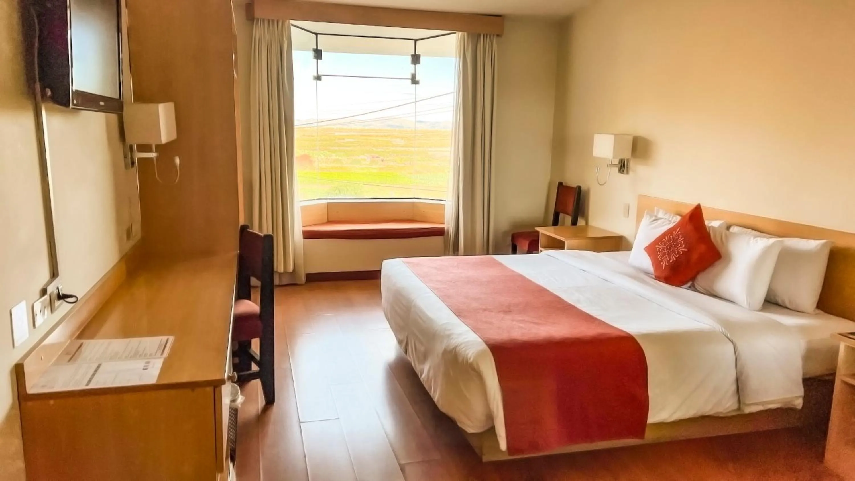 Photo of the whole room, Bed in Lake Titicaca Hotel