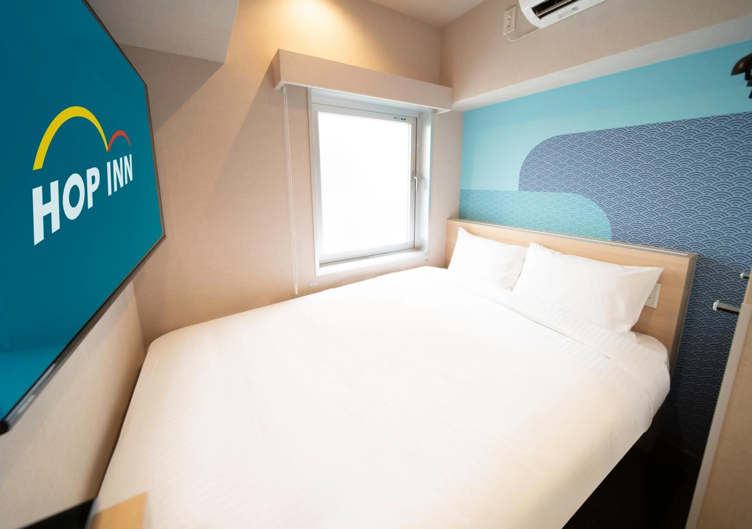 Bed in Hop Inn Tokyo Ueno