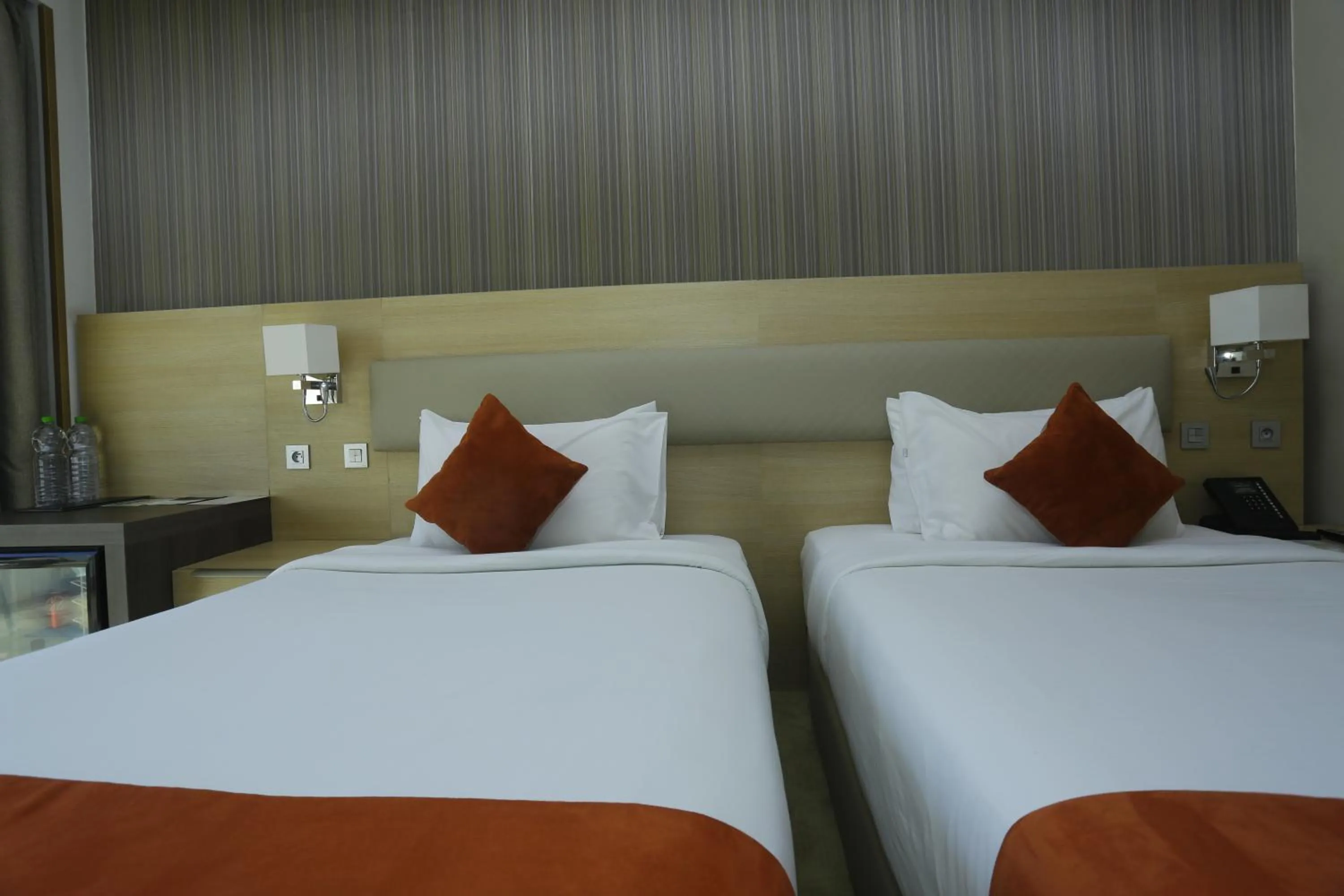 Bed in Royal Tulip City Center