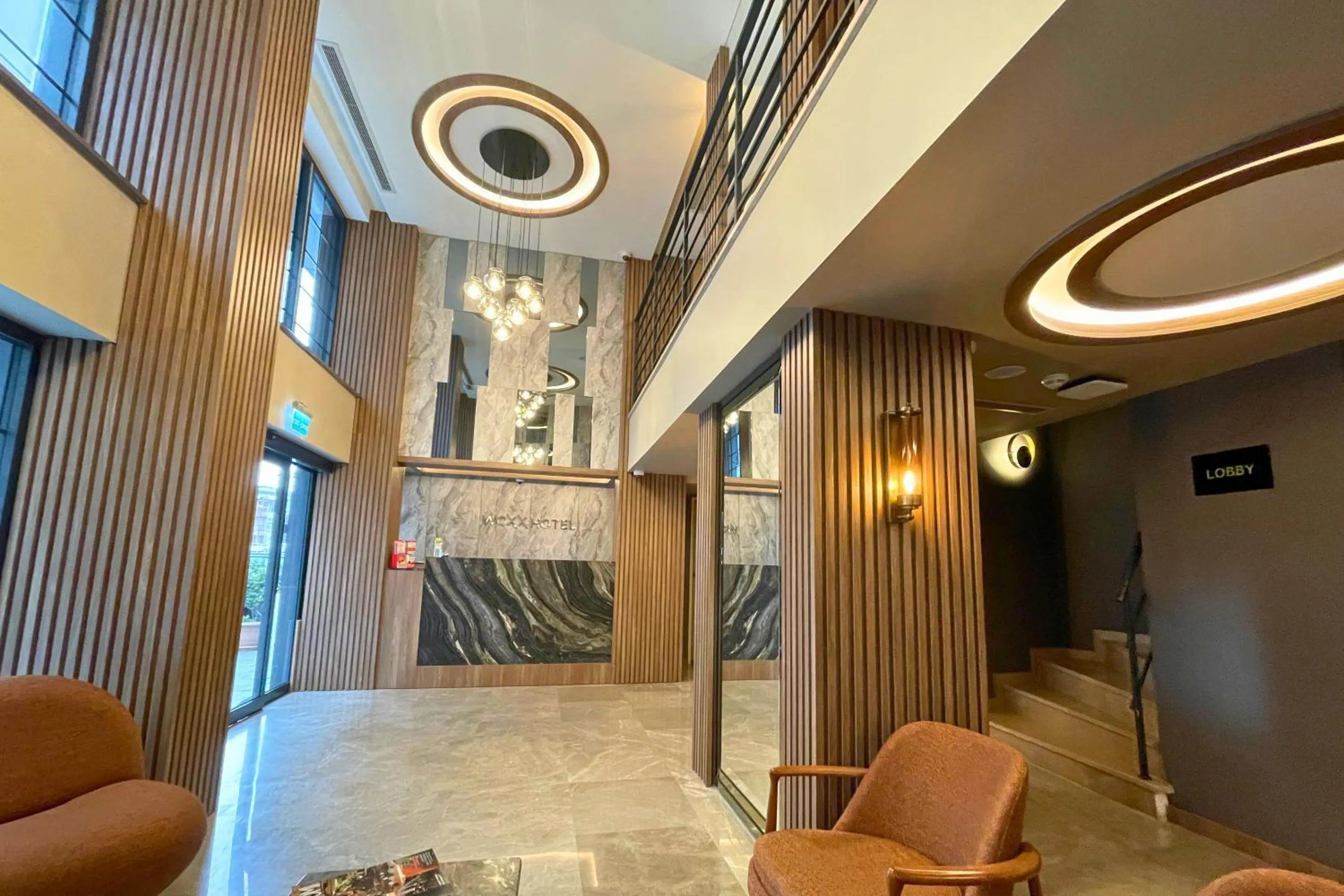 Lobby or reception in Woxx Hotel