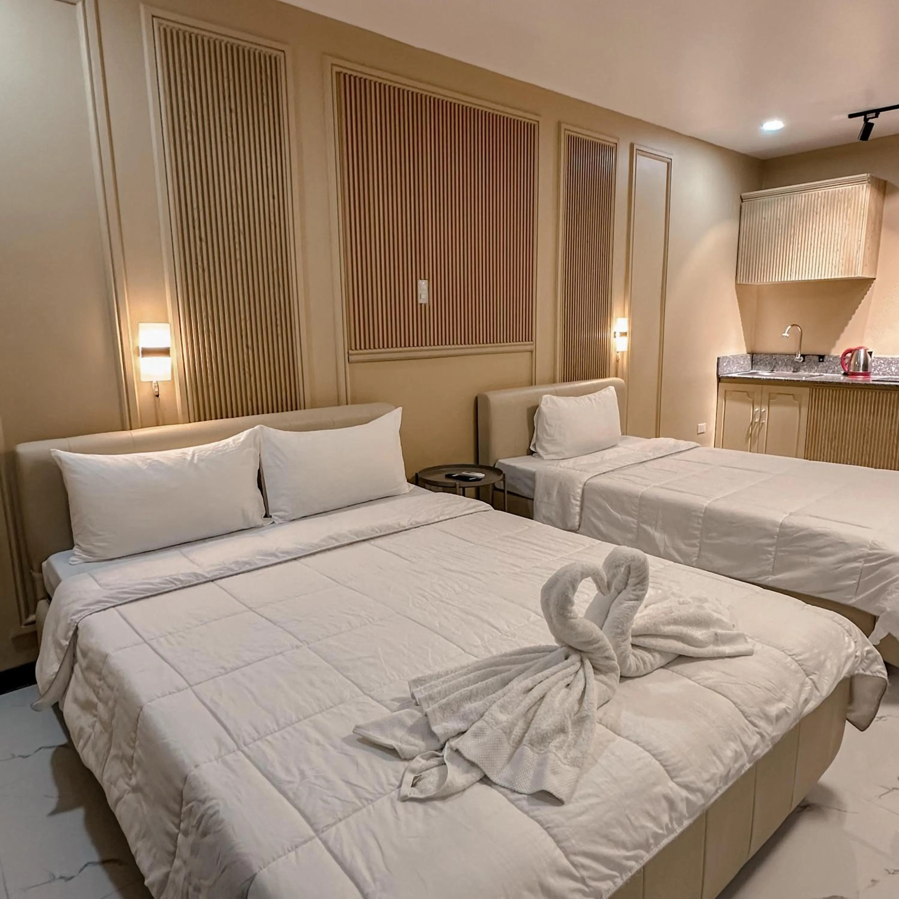 Bed in Clark CU Hotel