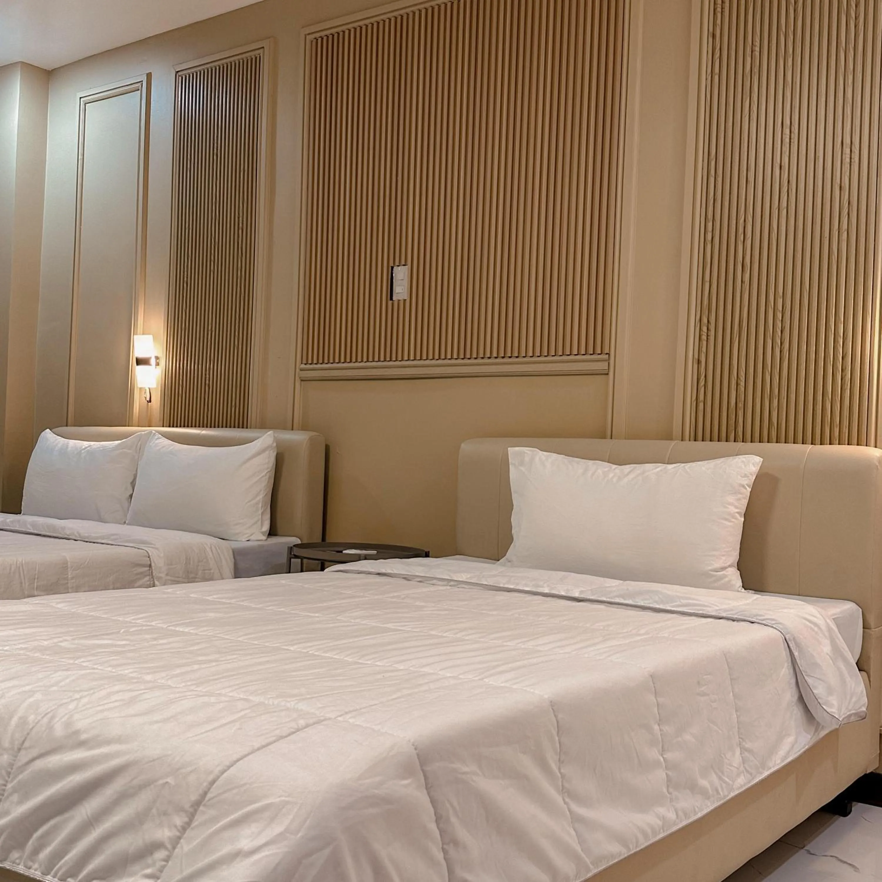 Bed in Clark CU Hotel