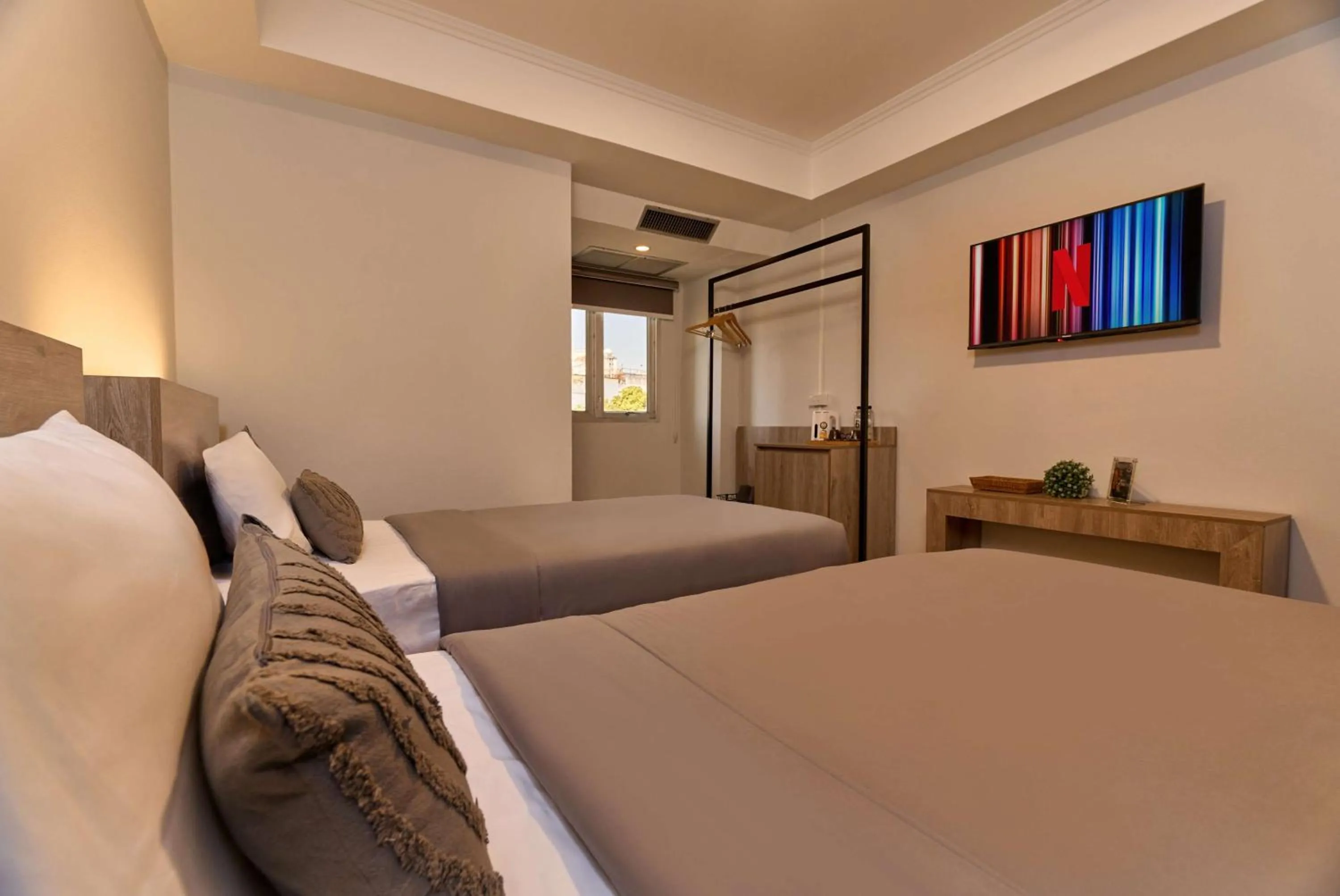 Bed in Thapae60 Mini Hotel