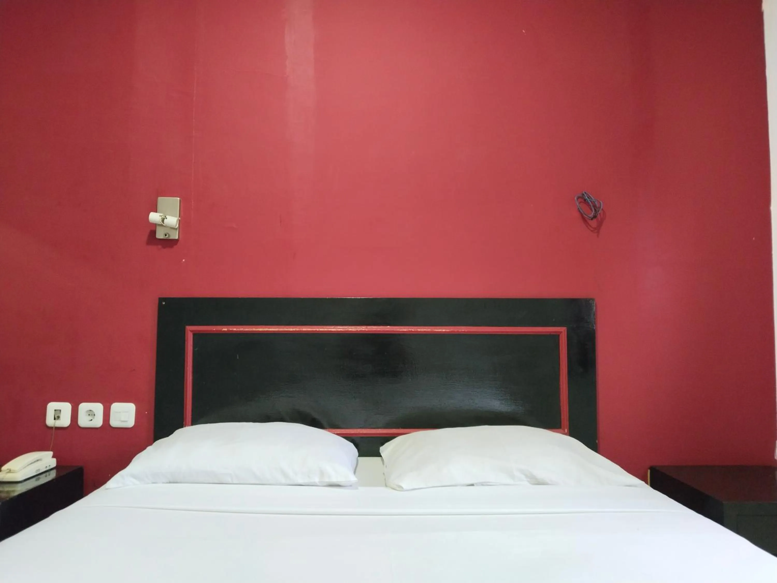 Bed in Metro Hotel Bekasi powered by Cocotel