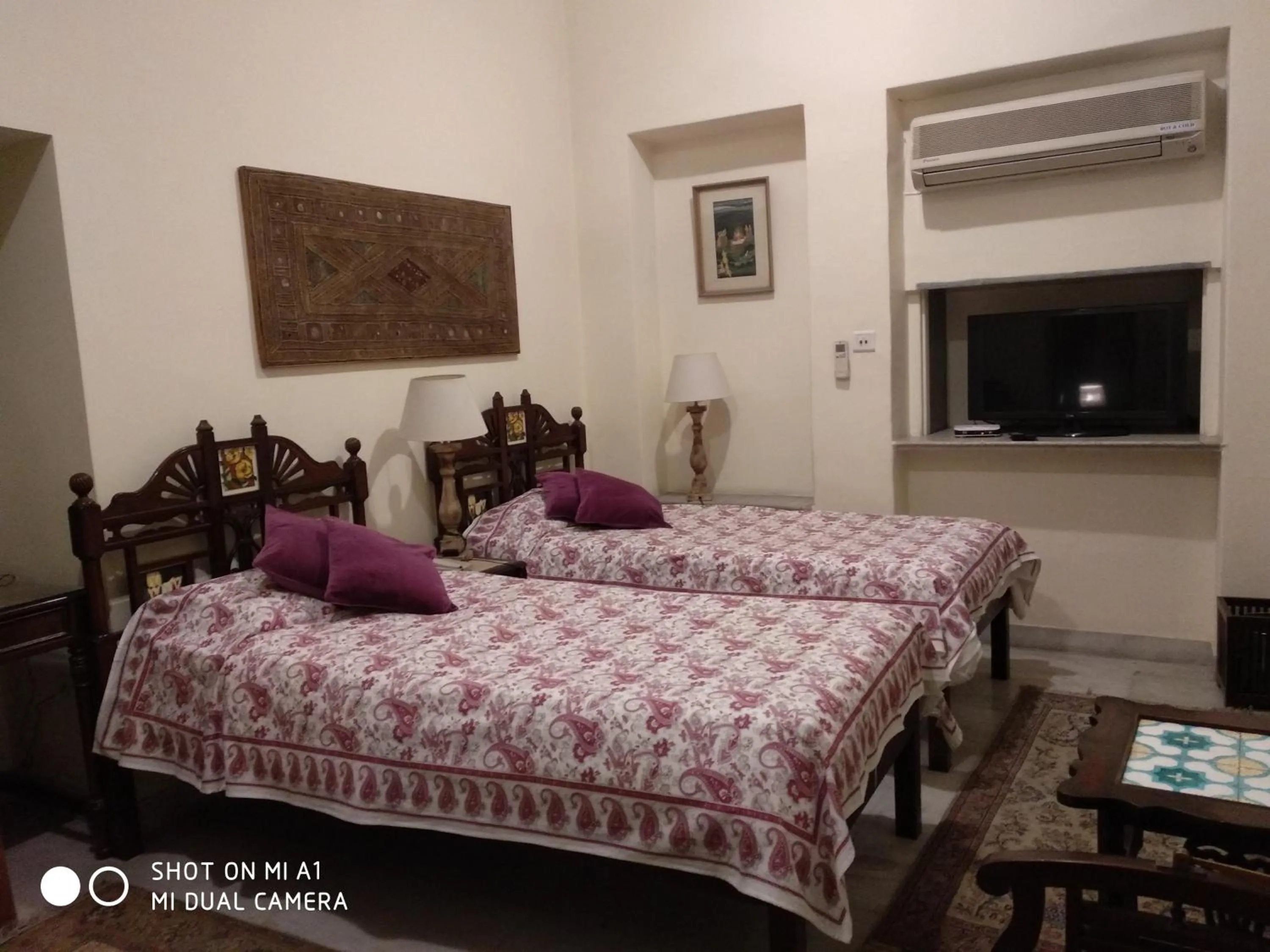 Bed in Hotel Meghniwas