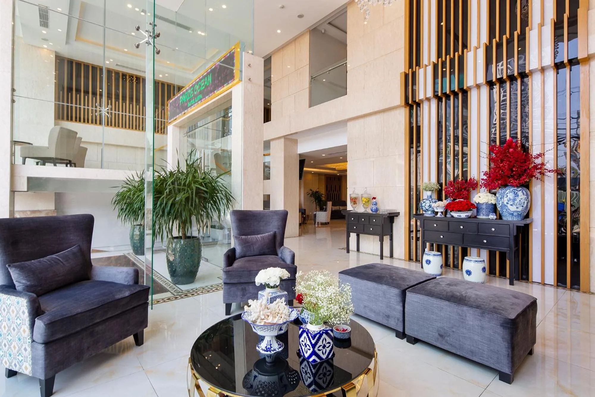 Communal lounge/ TV room in TGT BEACH HOTEL