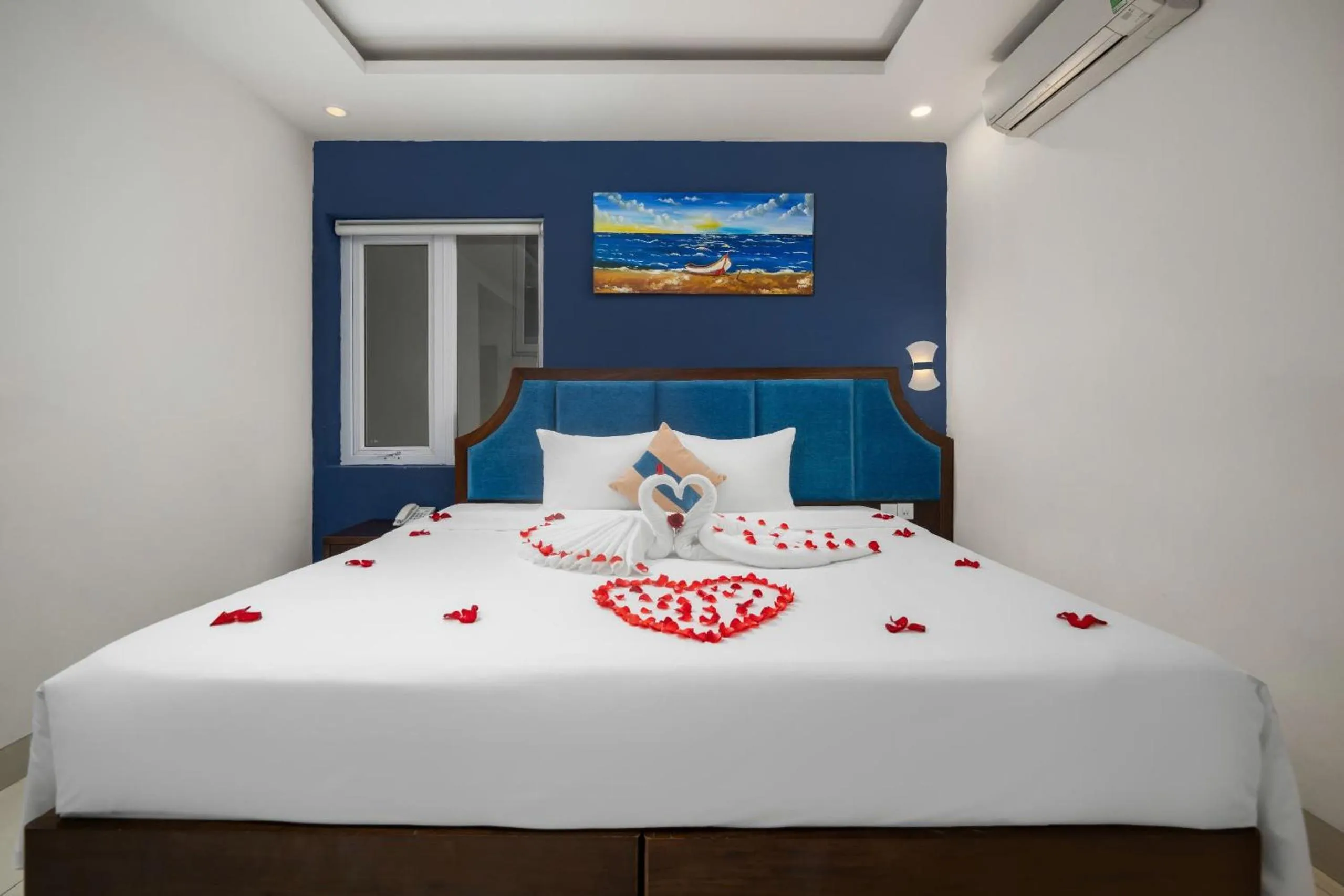 Bed in TGT BEACH HOTEL