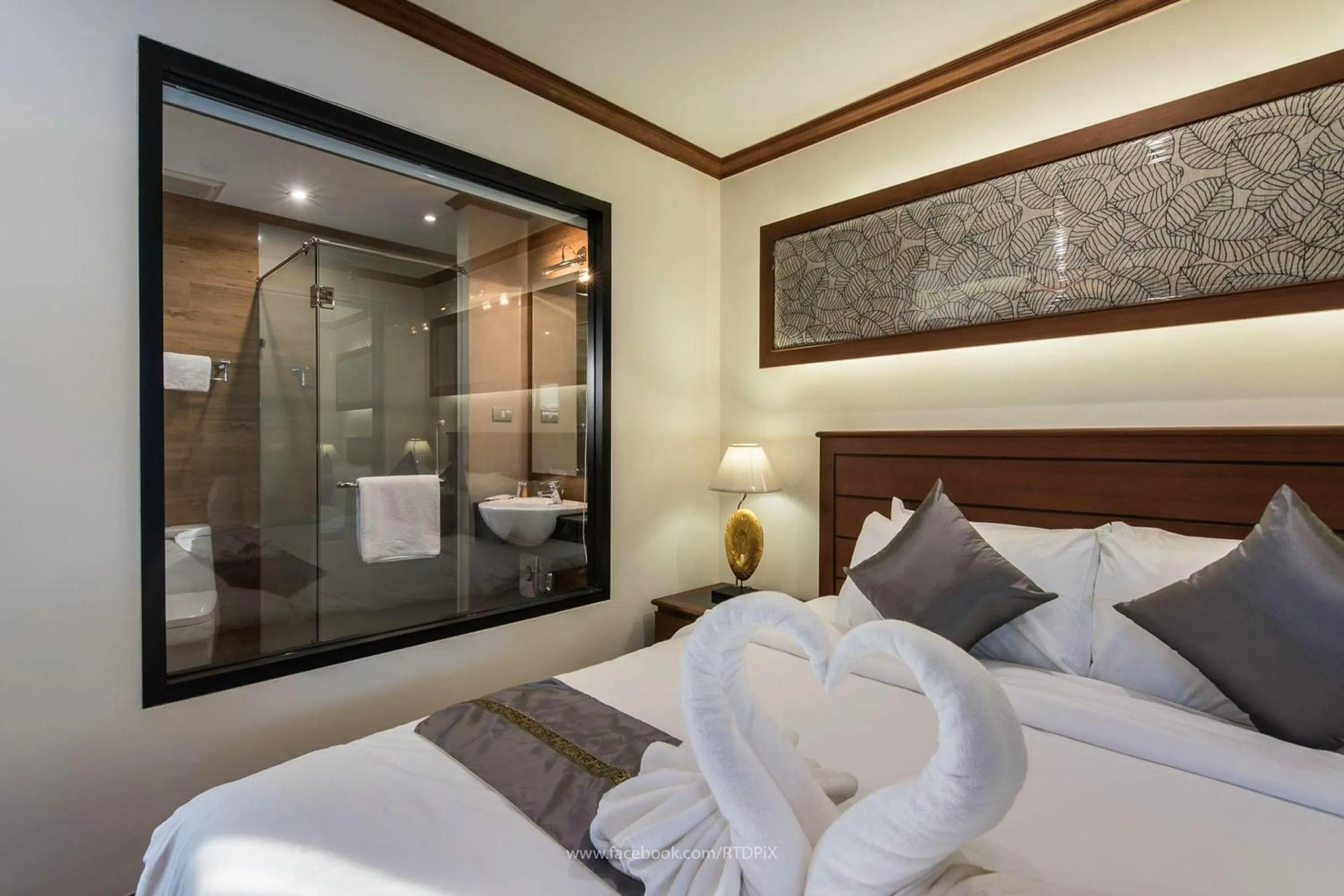 Bed in Lanna Tree Boutique Hotel