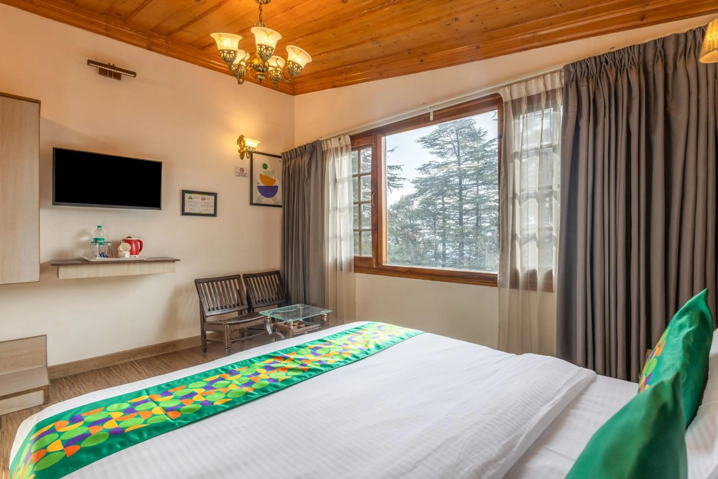 Bedroom, Bed in Treebo Premium Torrentium - A Heritage Hotel