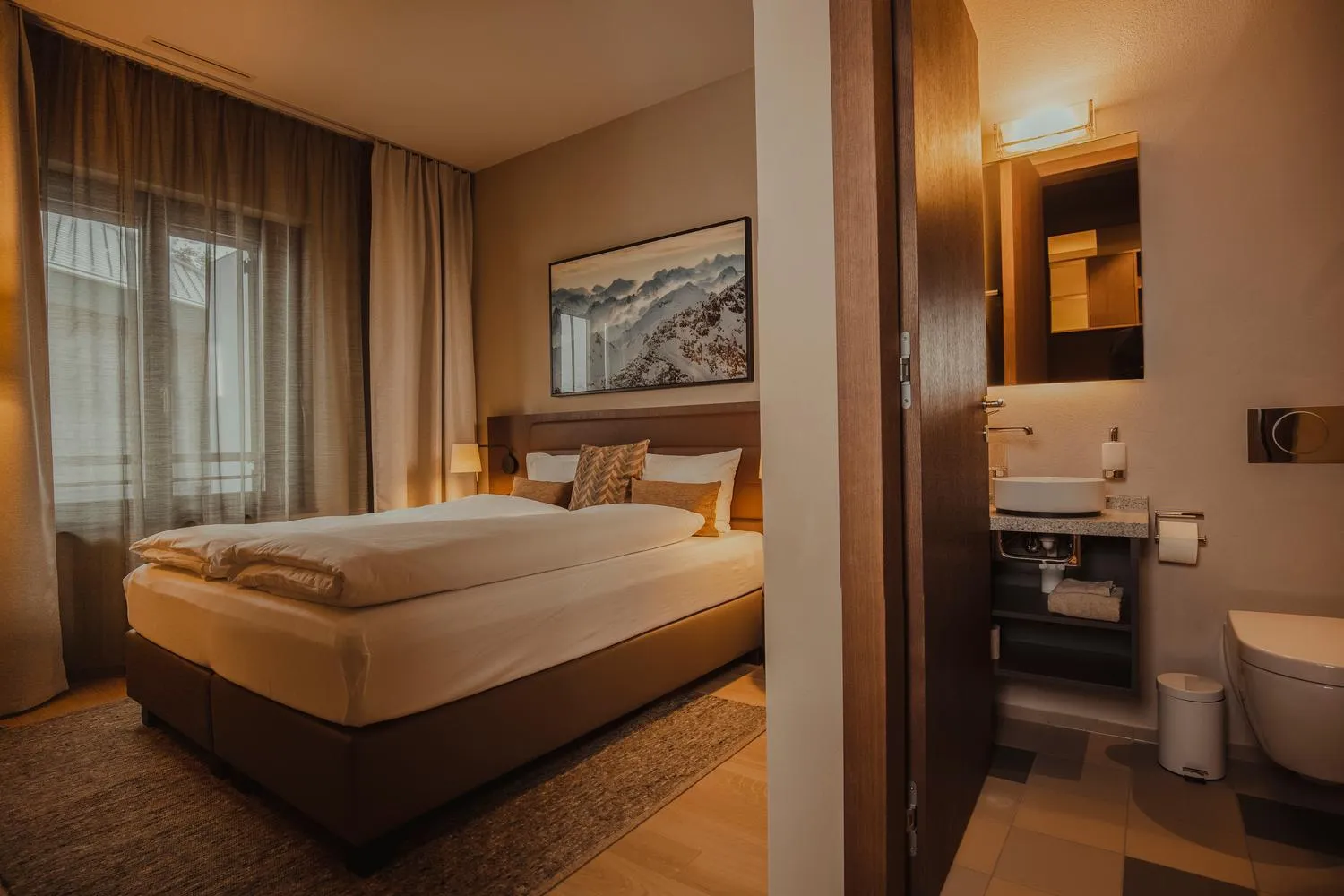 Bathroom, Bed in Andermatt Alpine Apartments