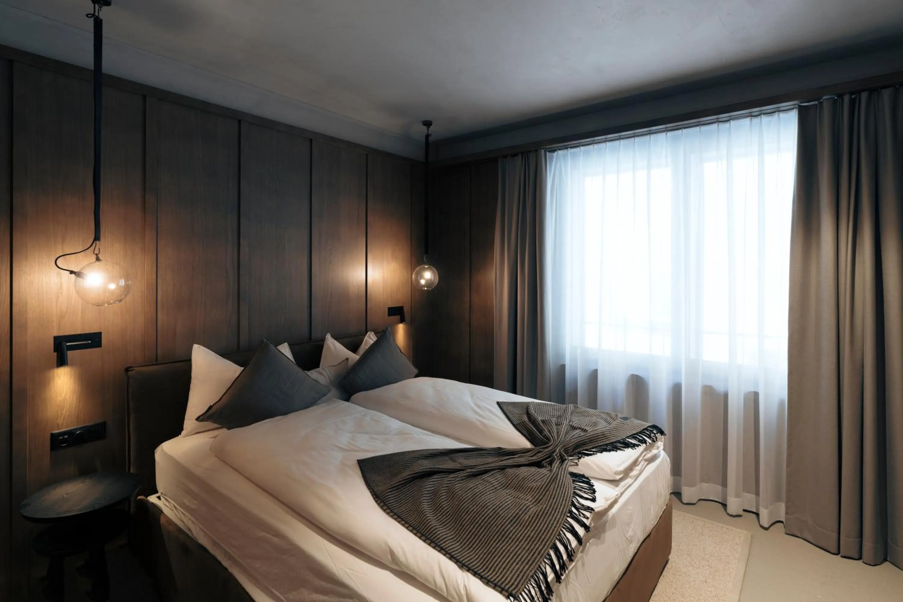 Bed in Andermatt Alpine Apartments