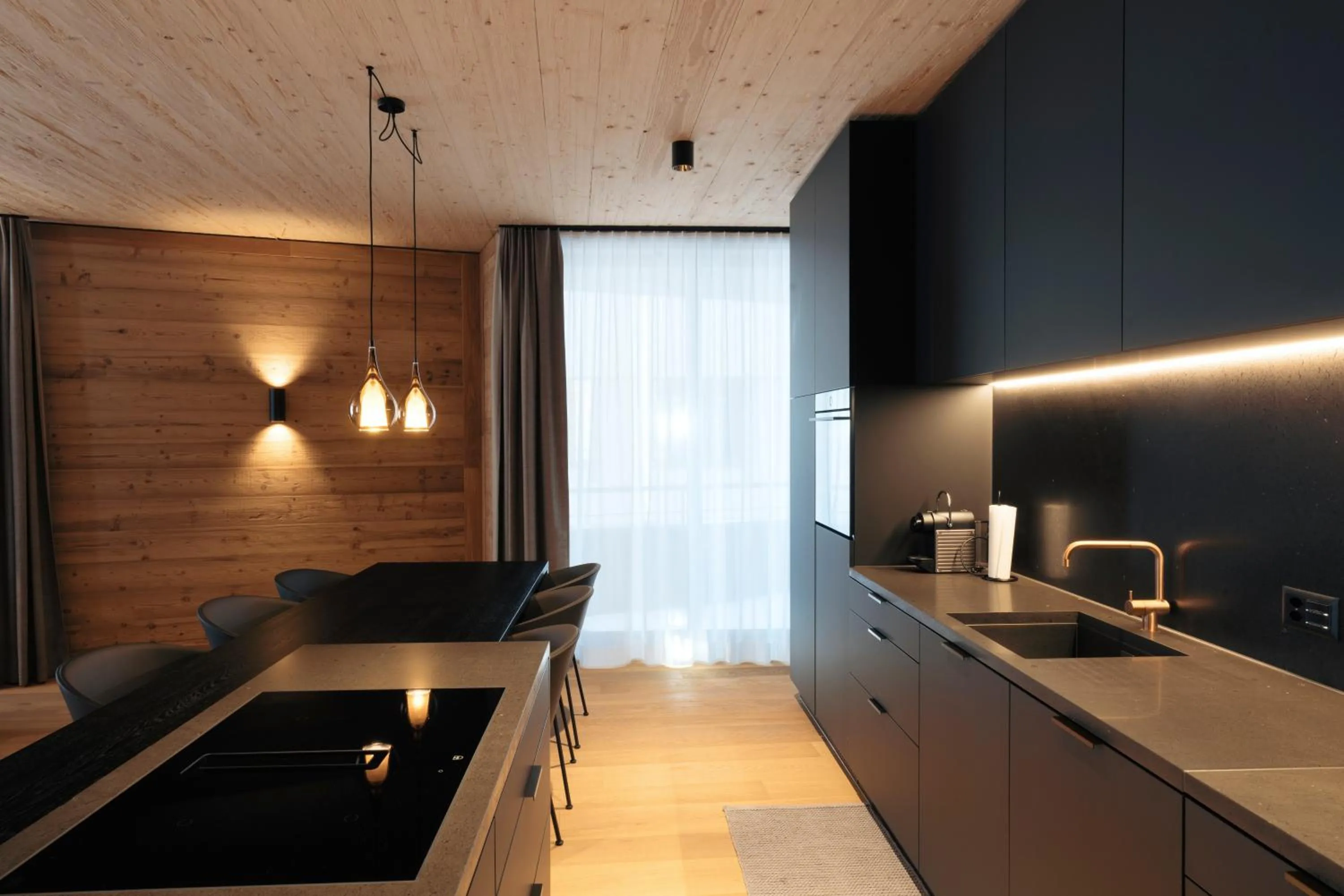 Kitchen or kitchenette in Andermatt Alpine Apartments