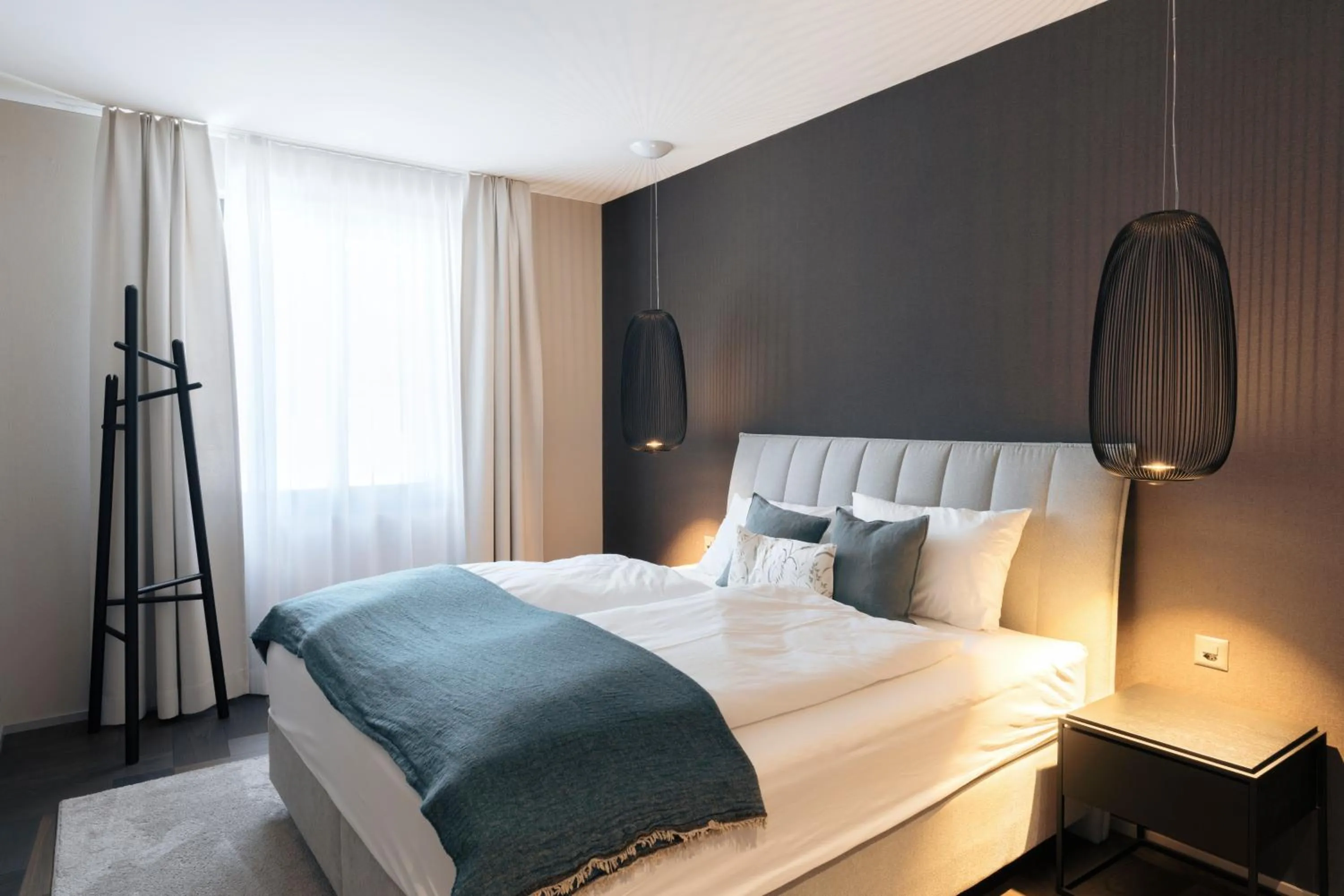 Bedroom, Bed in Andermatt Alpine Apartments