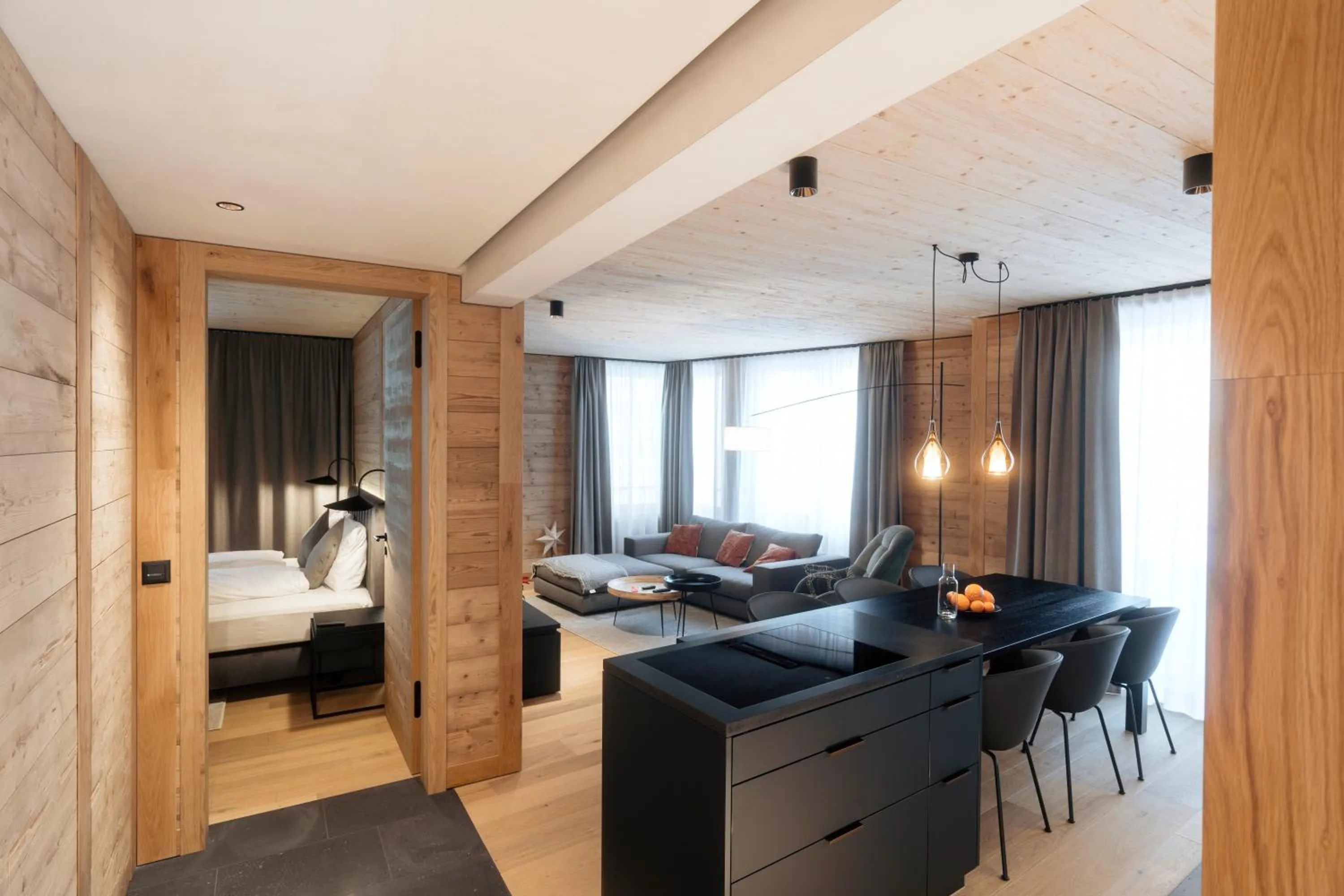 Living room, Bed in Andermatt Alpine Apartments