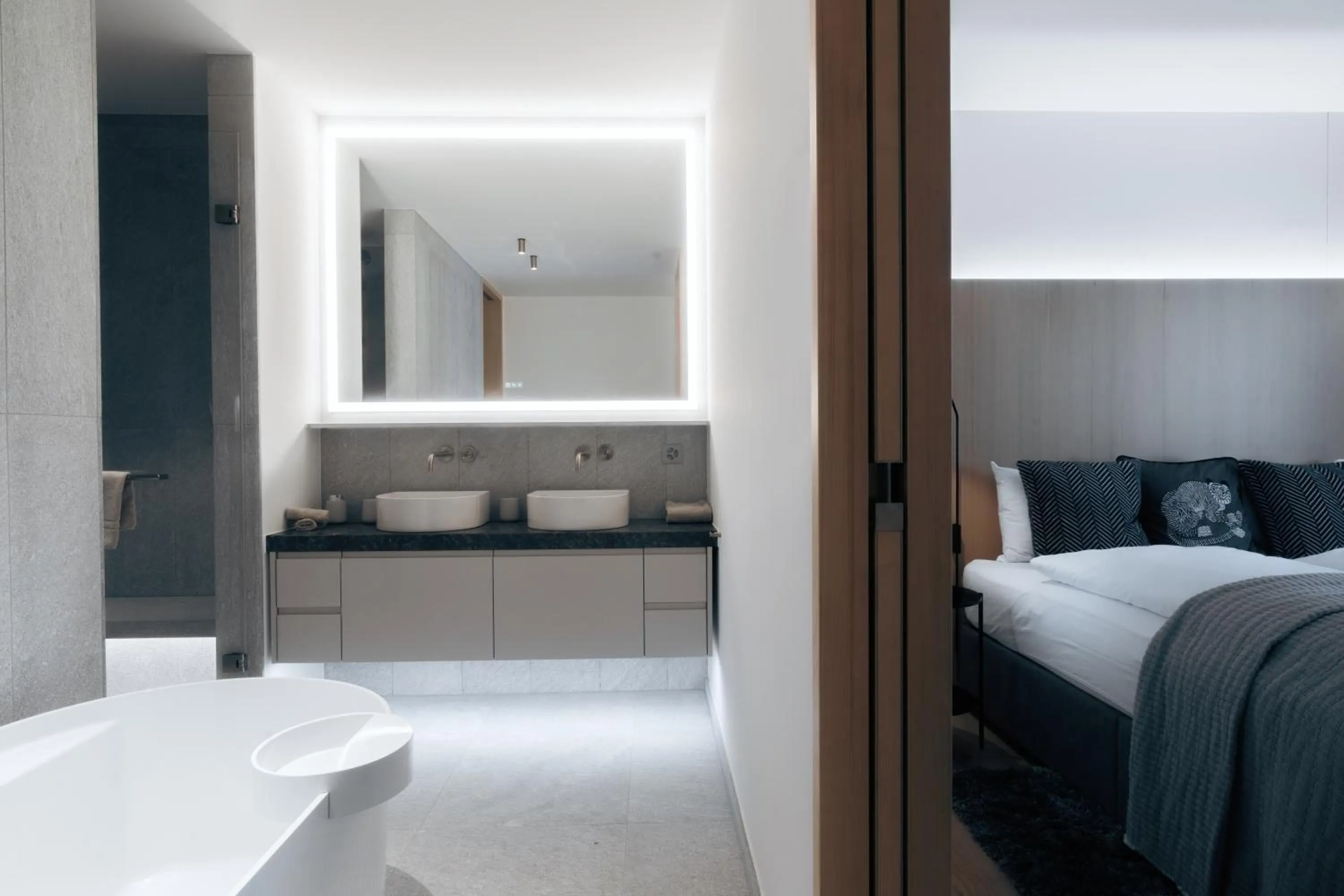 Bathroom, Bed in Andermatt Alpine Apartments
