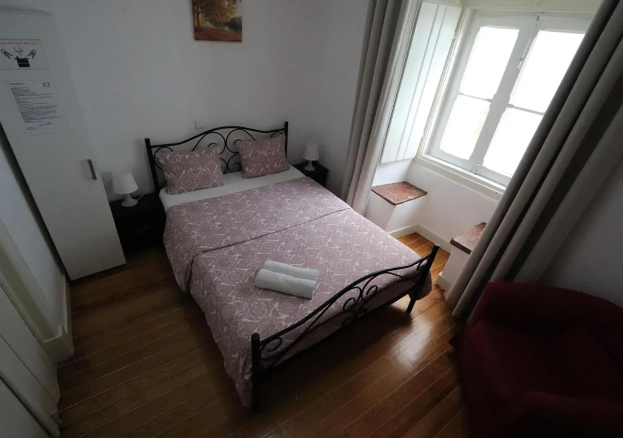 Bed in Welcome Guest House