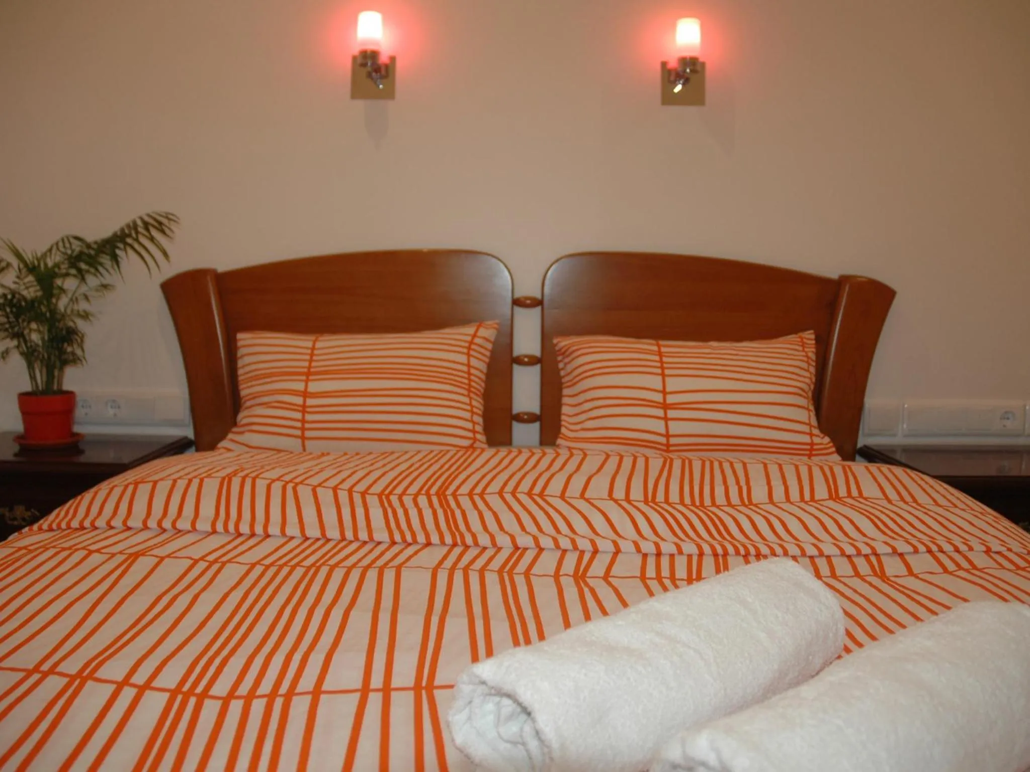Bed in Welcome Guest House