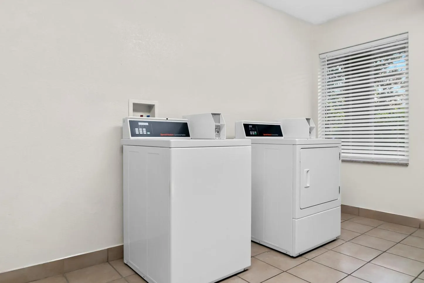 laundry in HomeTowne Studios by Red Roof Auburn Hills