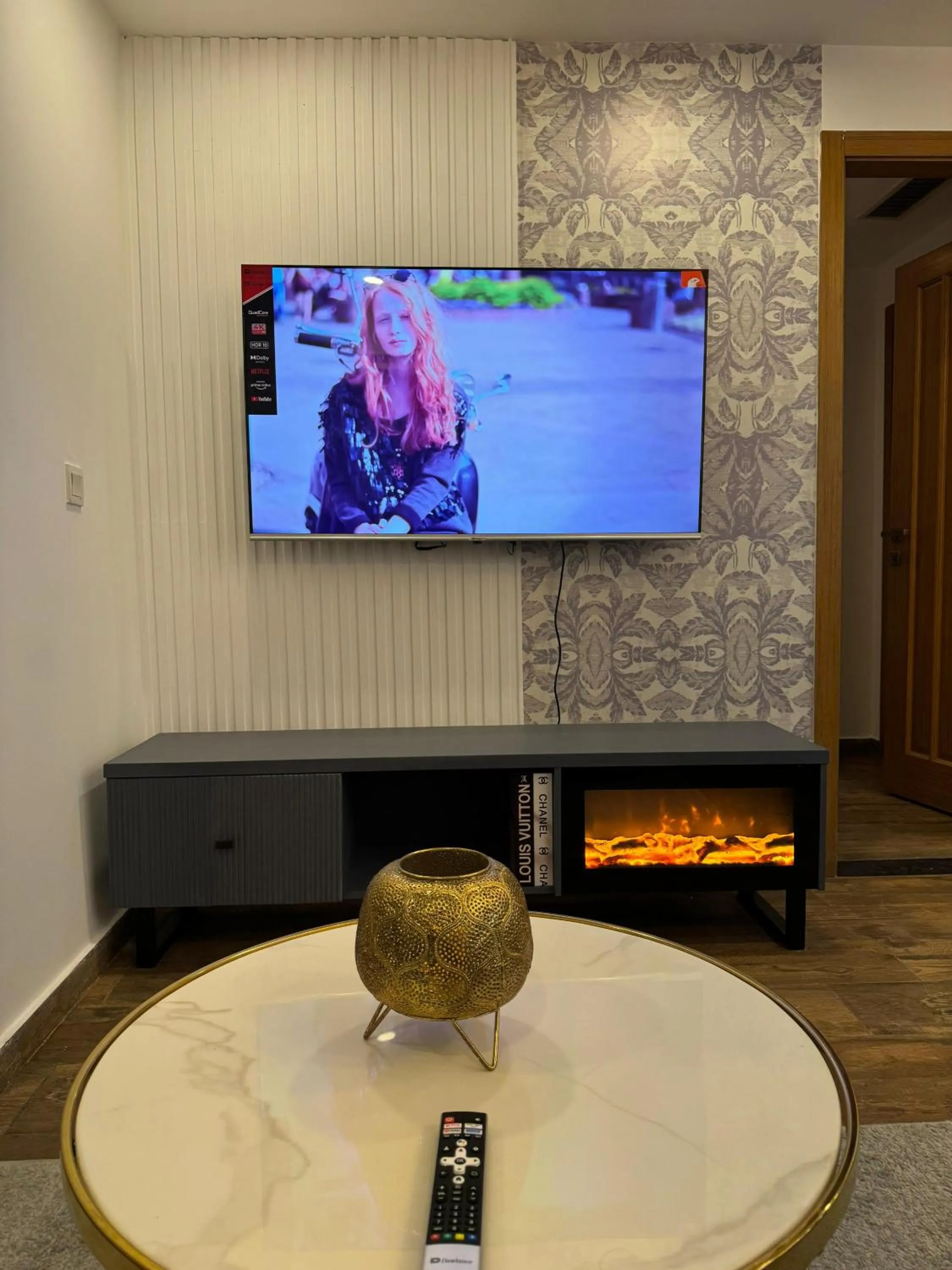 Communal lounge/ TV room in The Centaurus Apartments