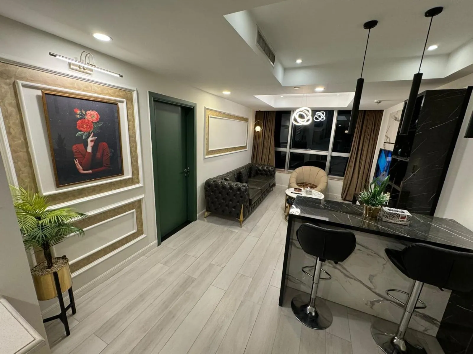 Communal lounge/ TV room in The Centaurus Apartments