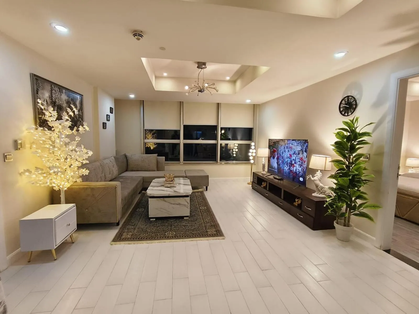 Communal lounge/ TV room in The Centaurus Apartments