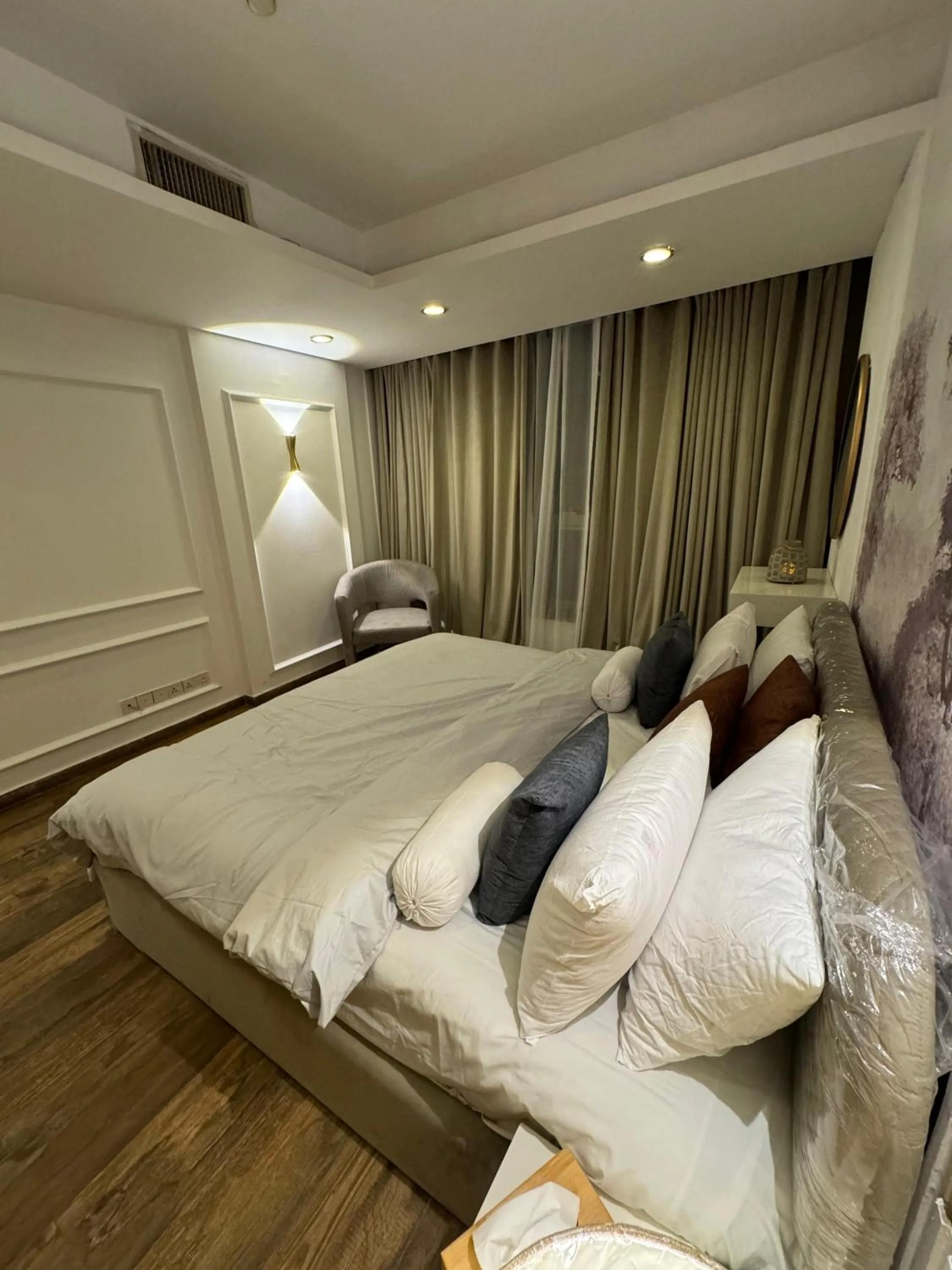 Bed in The Centaurus Apartments