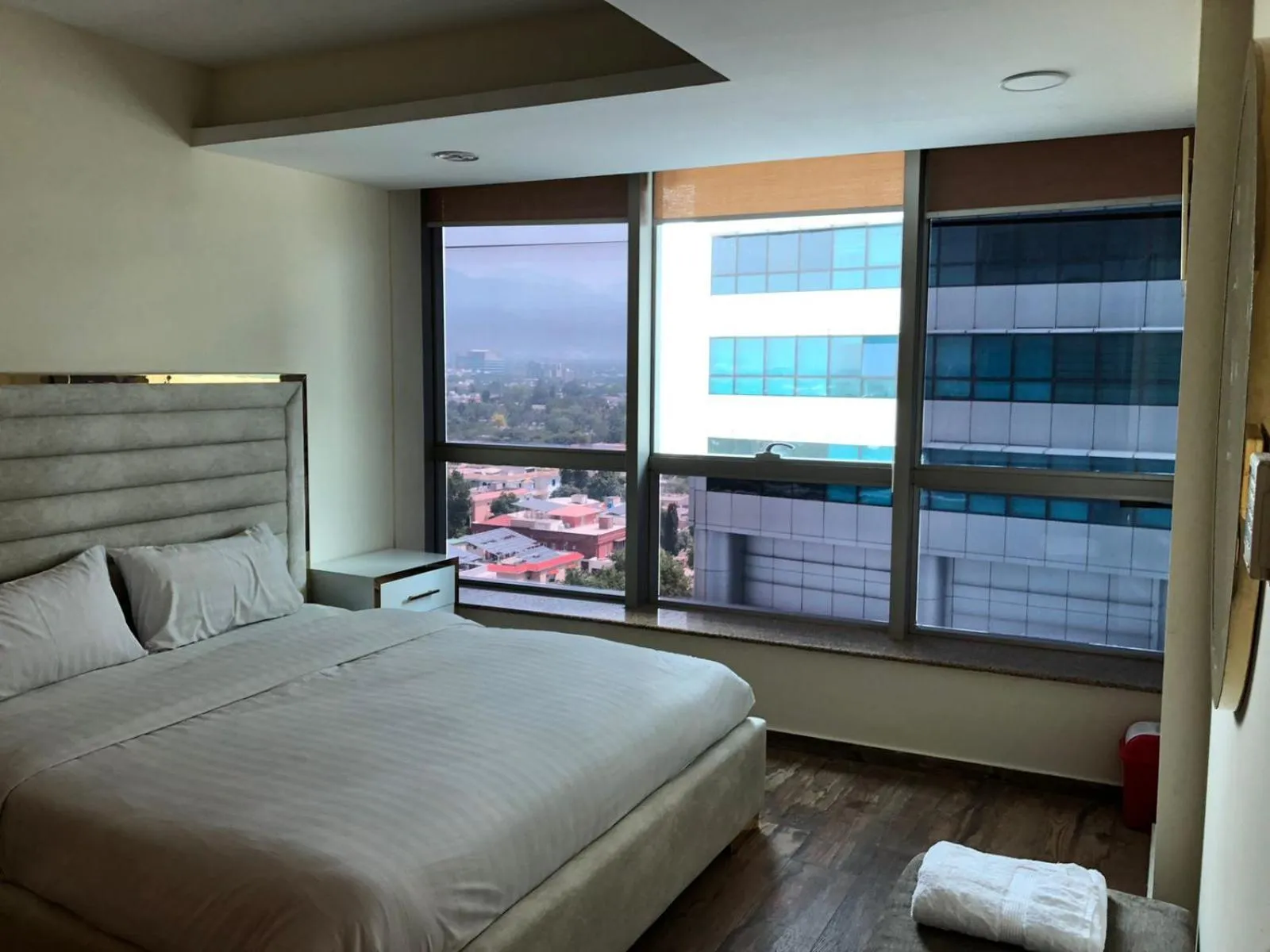 Bed in The Centaurus Apartments